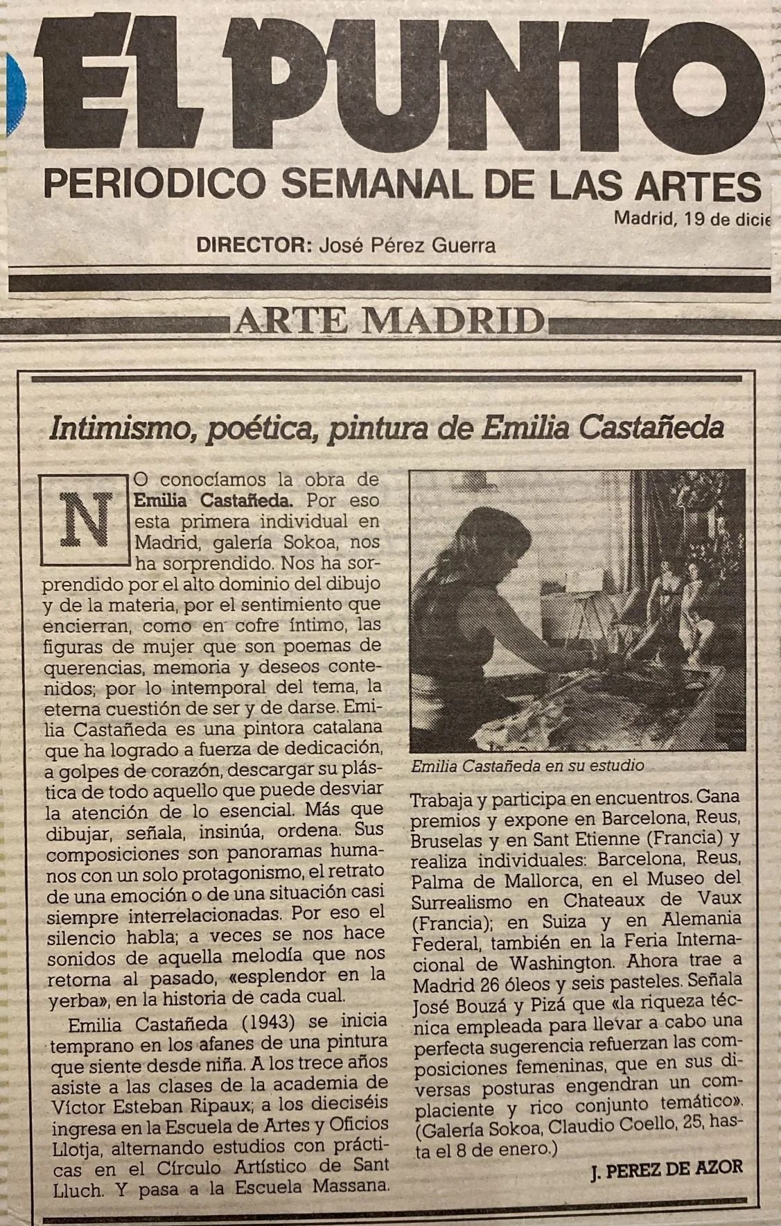 A newspaper article about Emilia Castañeda, a Spanish painter, including a black and white photograph of her working in her studio surrounded by paintings and art supplies.