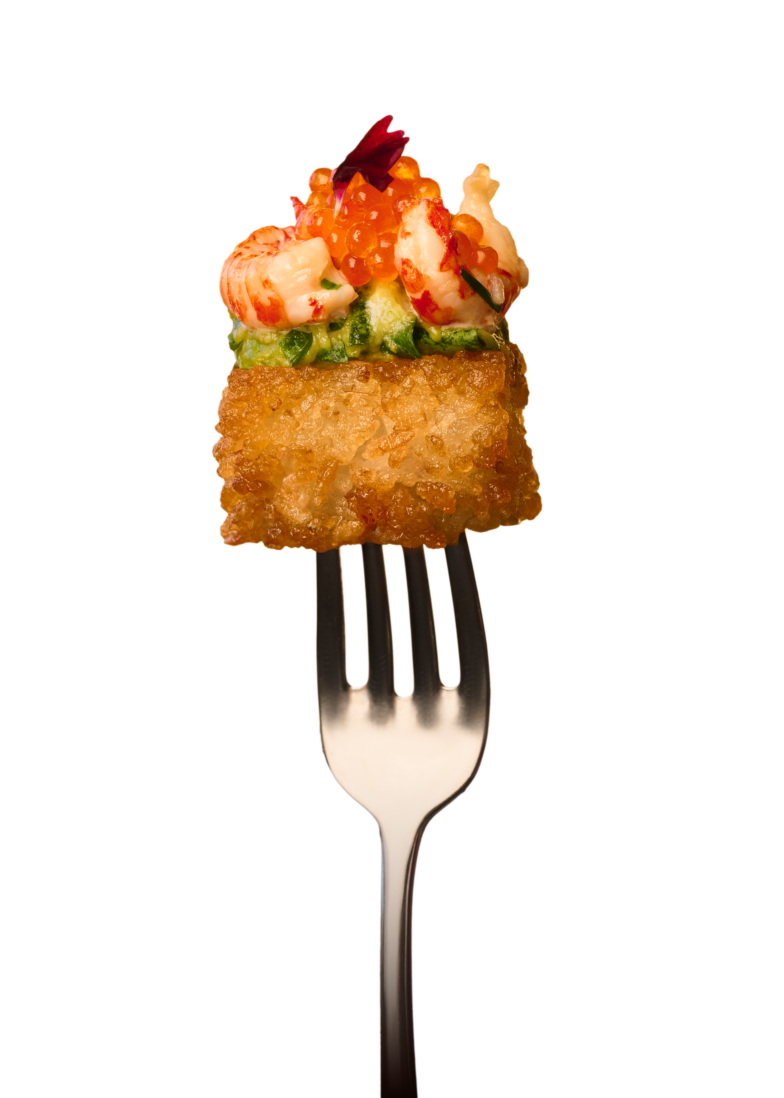 Une bouchée appétissante avec avocat, crevettes, joliment travaillé, sur une fourchette.