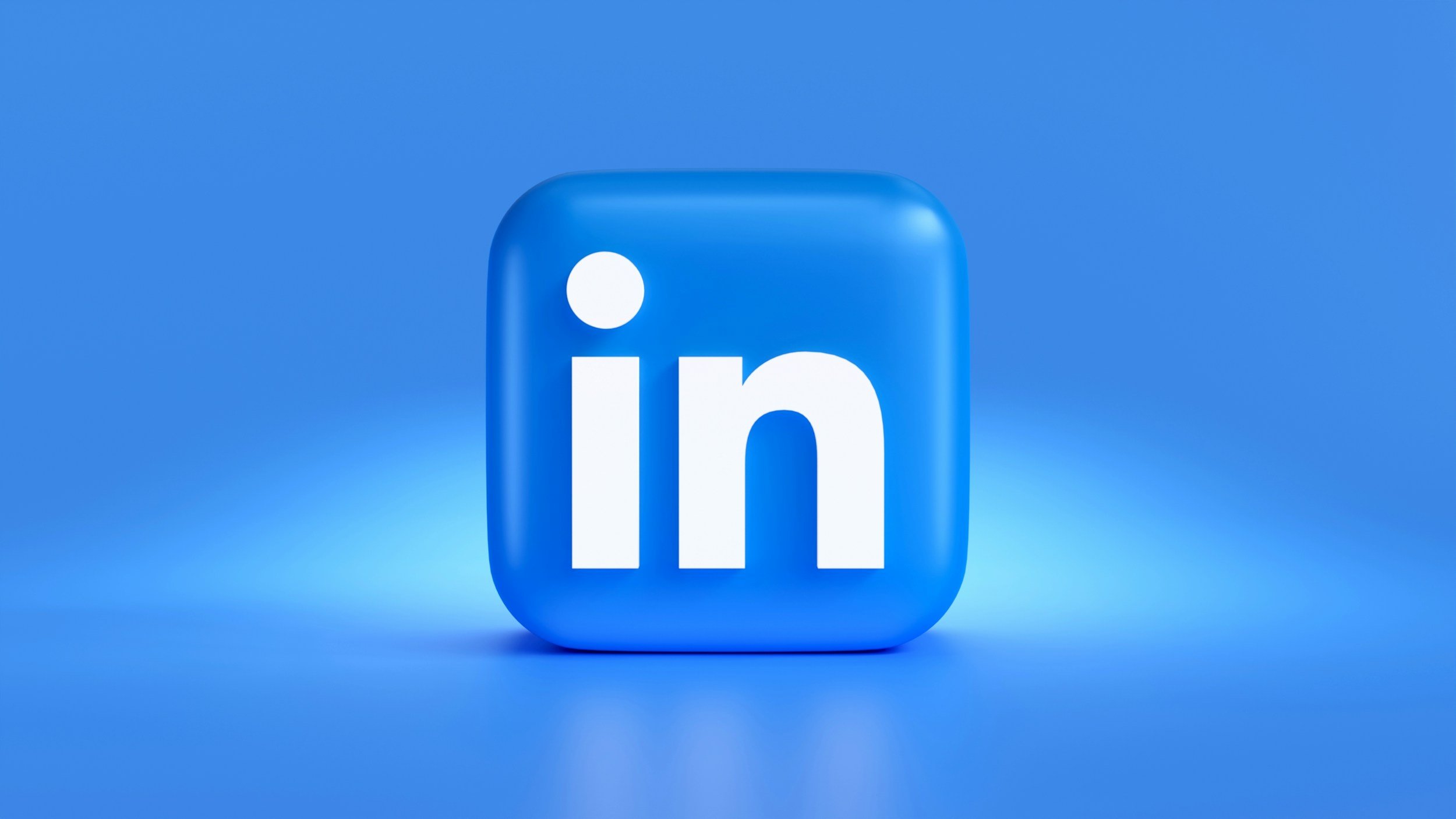LinkedIn logo in a blue rounded square on a blue background.