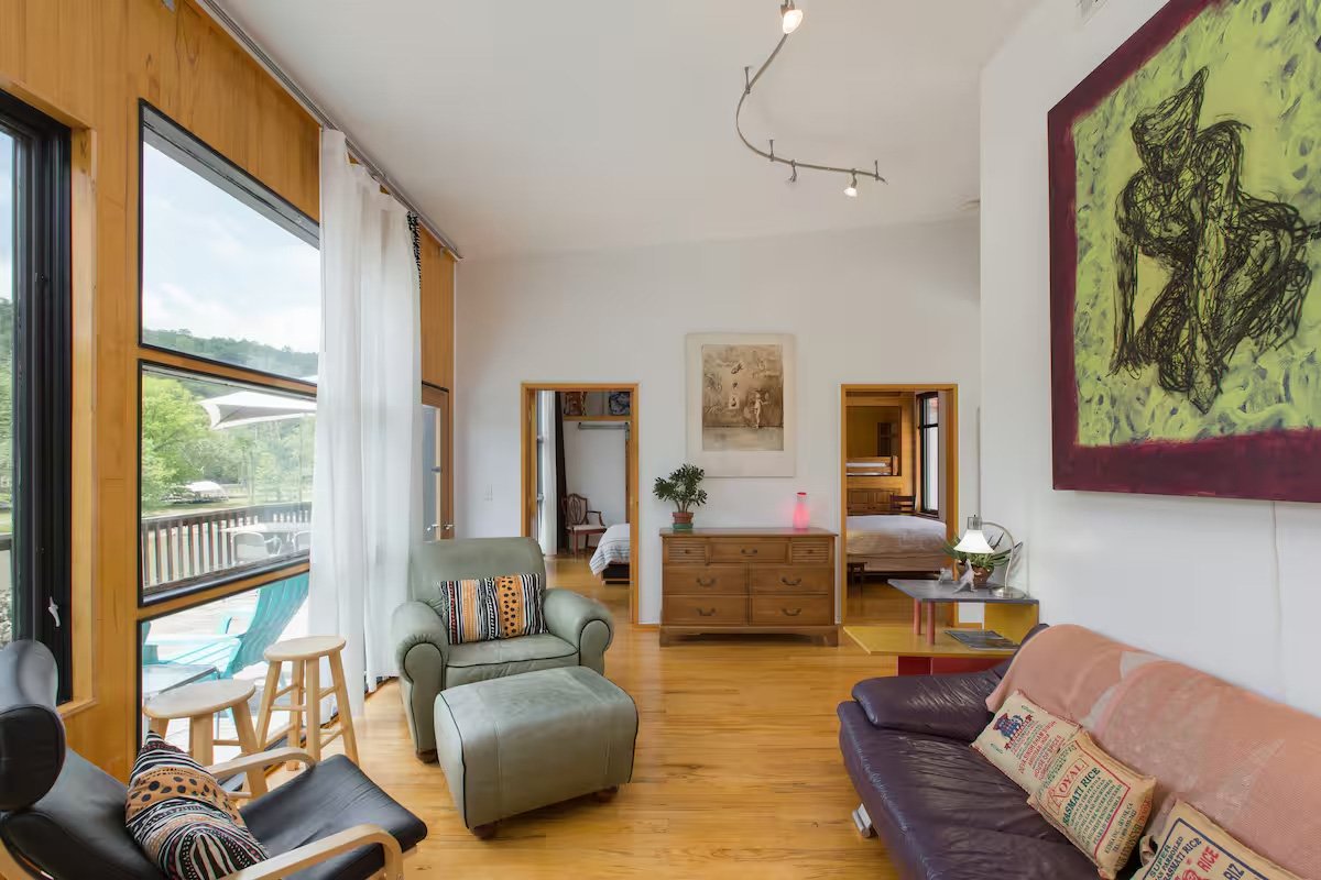 31 N. Main - 

There is nothing else like this in Western North Carolina! It's a spacious, art-filled, architecturally unique urban loft space in a converted car dealership built in the 1920s. It’s a large, modern and comfortable, standout loft apart