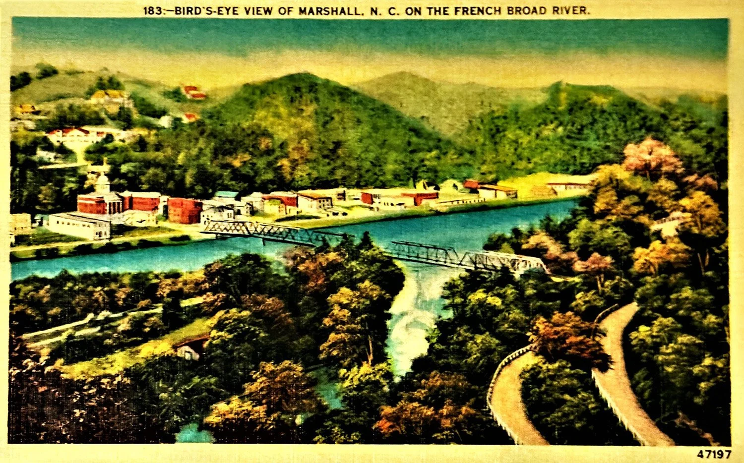 Historic photo showing the bridge between Blannahassett Island and Downtown Marshall