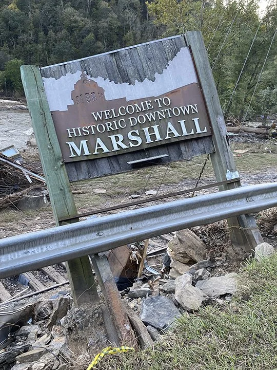The Welcome to Marshall sign survived the flood, but just barely