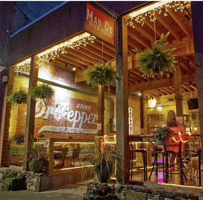 Mad Co. Brew & Pizza is a downtown Marshall staple serving up small-batch craft beer alongside fresh, made-to-order pizza, salads, and shareable bites in a lively riverside setting. With a relaxed taproom and kitchen atmosphere, it’s a go-to spot for