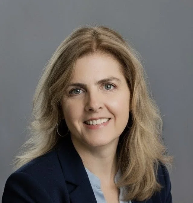 A professional headshot of copyeditor Heather Pendley.