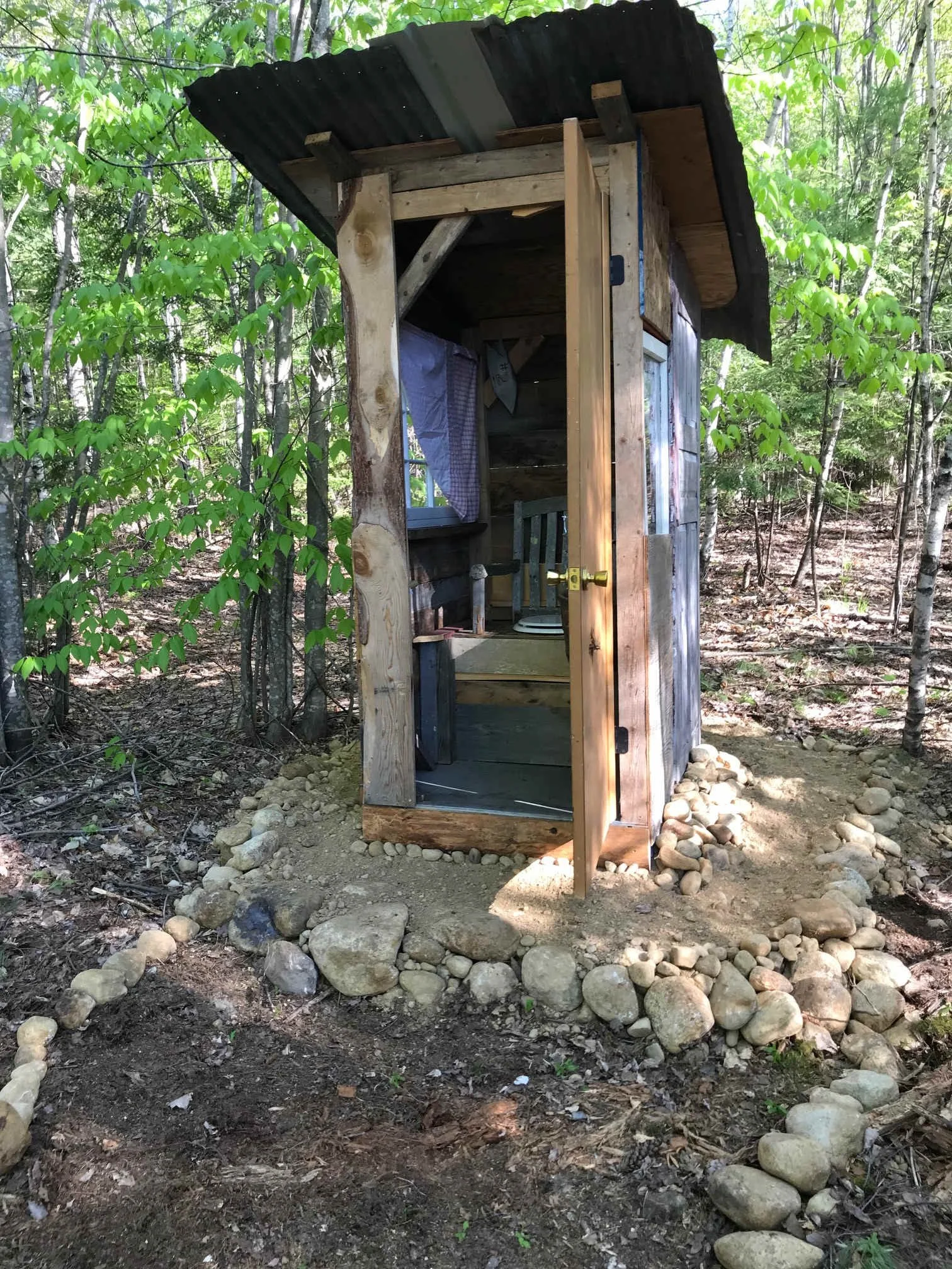 open door outhouse.jpeg