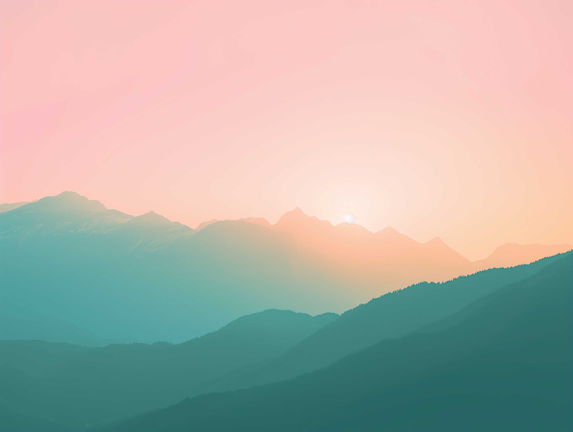Sunset over mountain range with soft pink and blue sky.