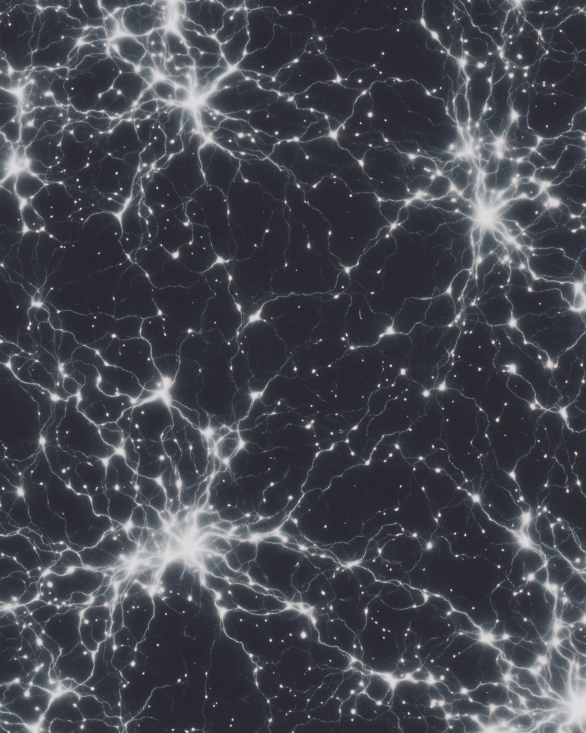 Close-up of shimmering, interconnected, lightning-like electrical discharges against a dark background, resembling a network of glowing lines and points.
