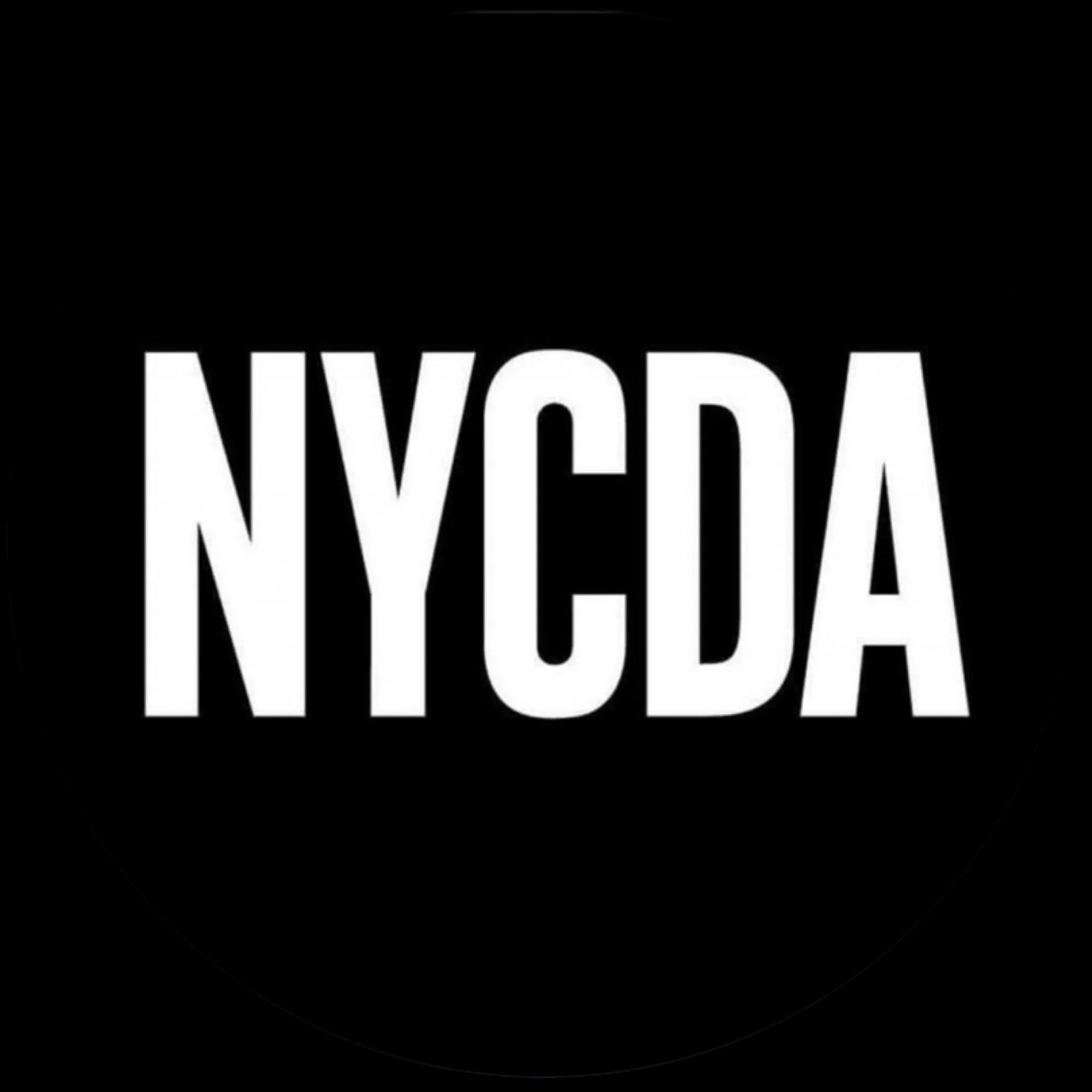 Black background with large white text reading "NYCDA".