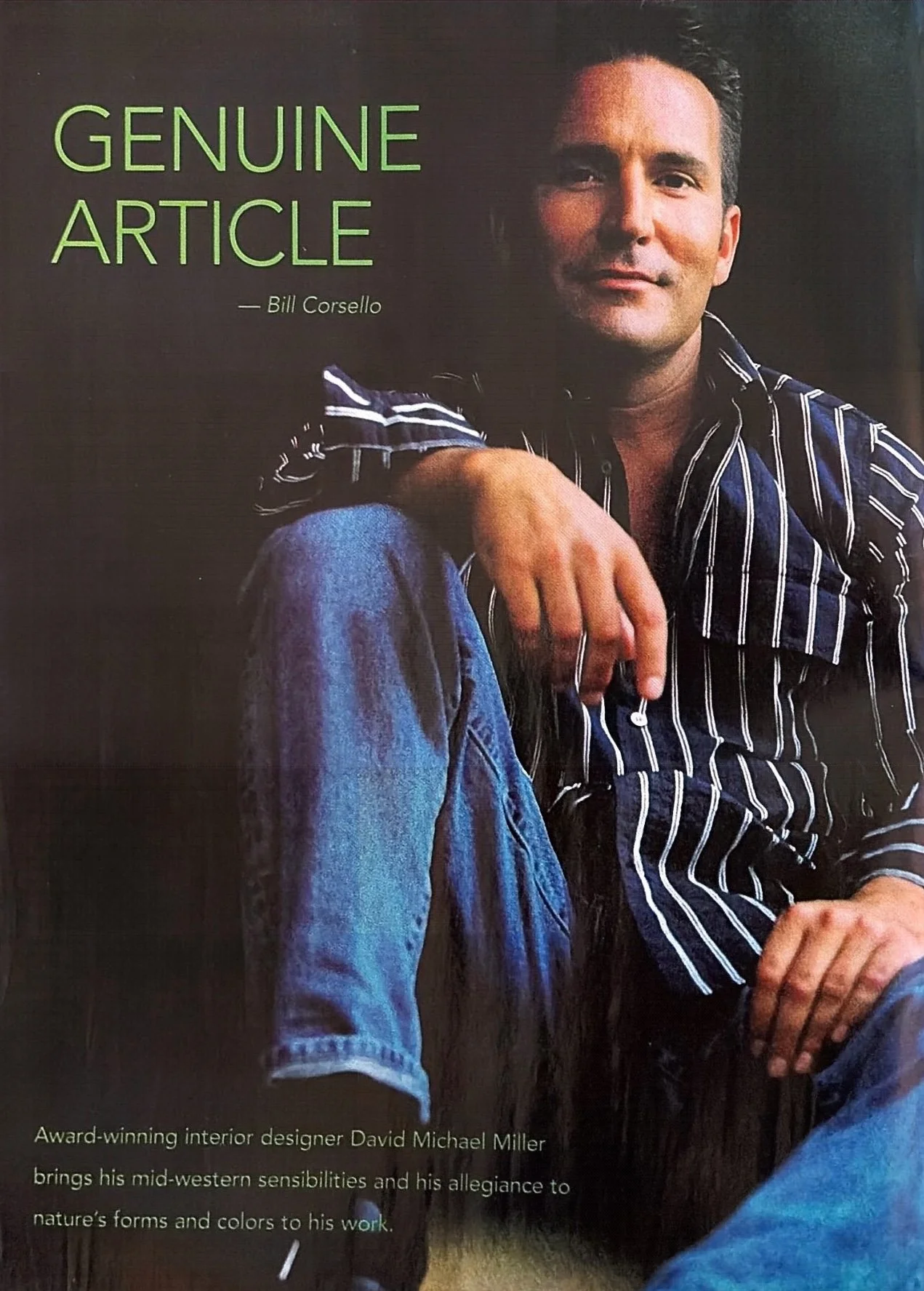 Magazine page featuring a man in a black and white stripe shirt and blue jeans, sitting with crossed legs and resting his arm on his knee. The text reads 'Genuine Article' by Bill Corsello, with additional smaller text about interior designer David Michael Miller.