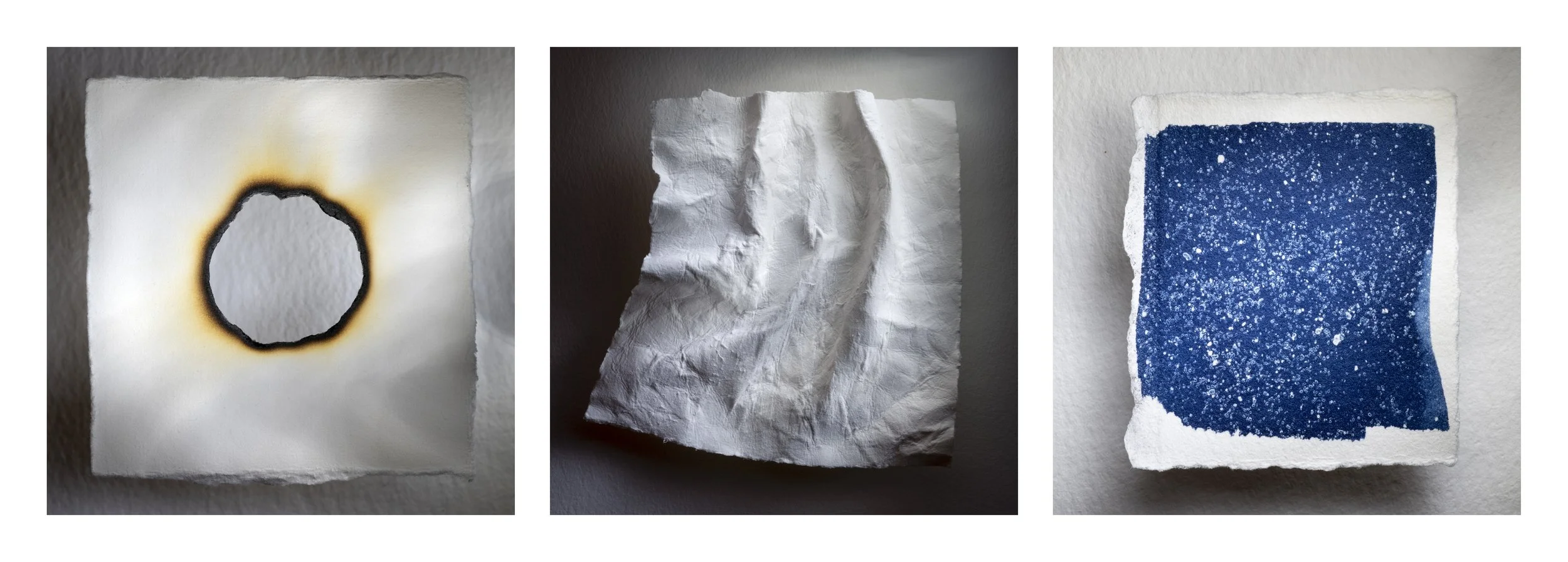 A triptych artwork distilling the essential elements of a coastal landscape through burned paper, manipulated paper, and sand cyanotypes.