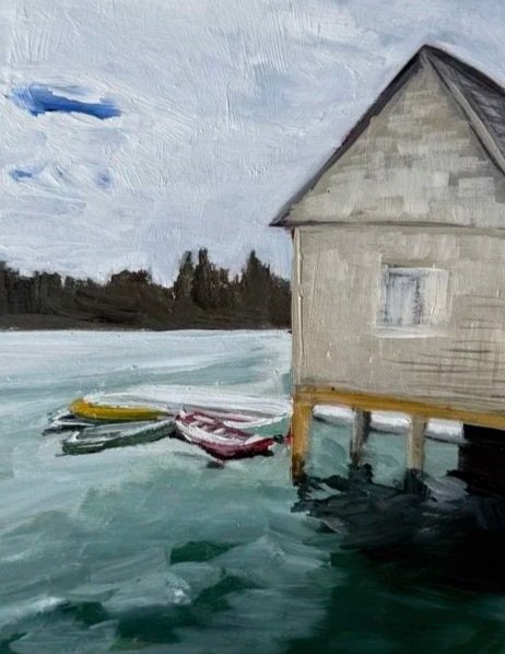 A painting of a lakeside scene with a wooden boathouse and two boats, under a partly cloudy sky.