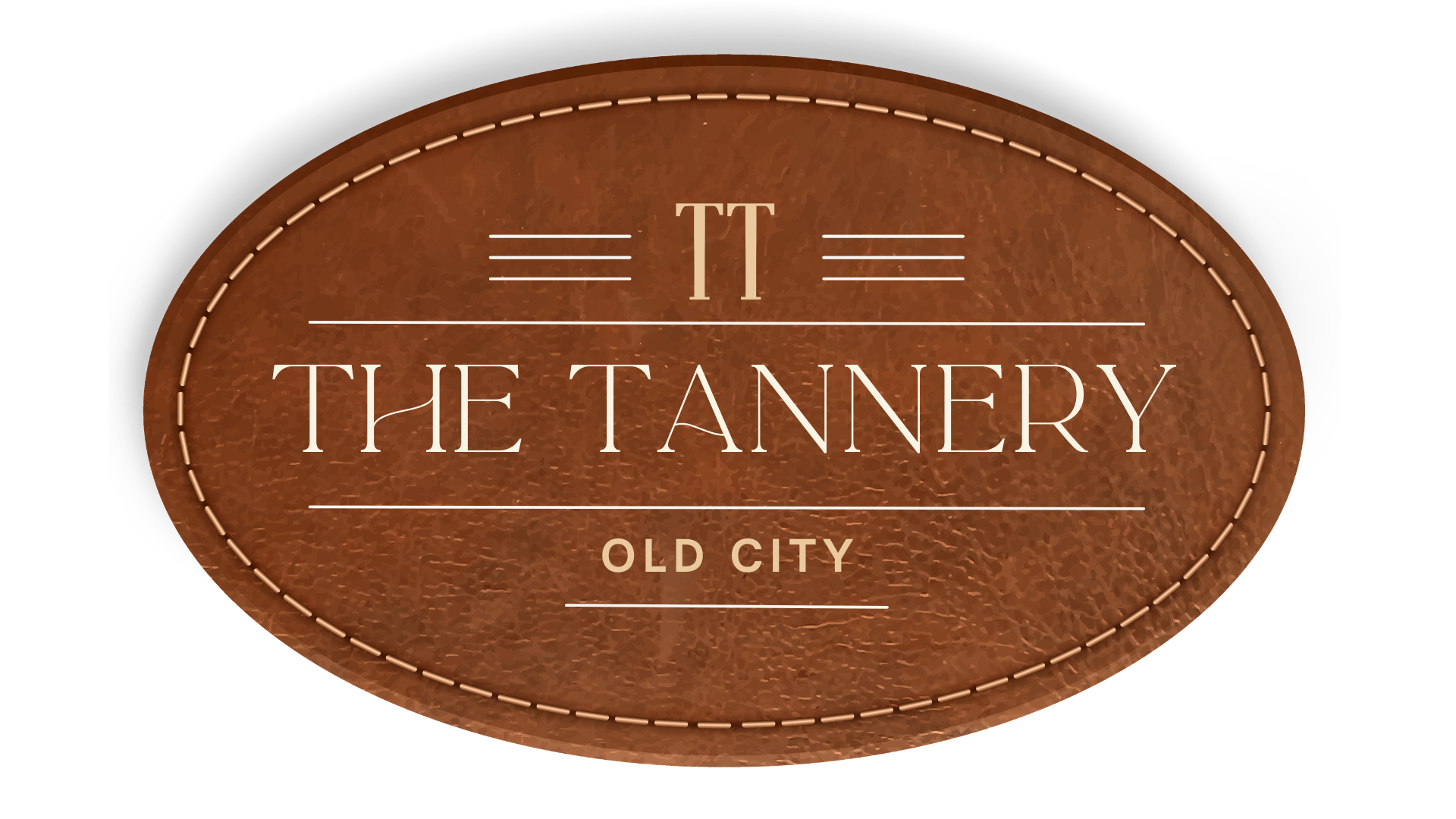 A leather oval sign reads "The Tannery" in large letter with "Old City" below, and "TT" at the top center.