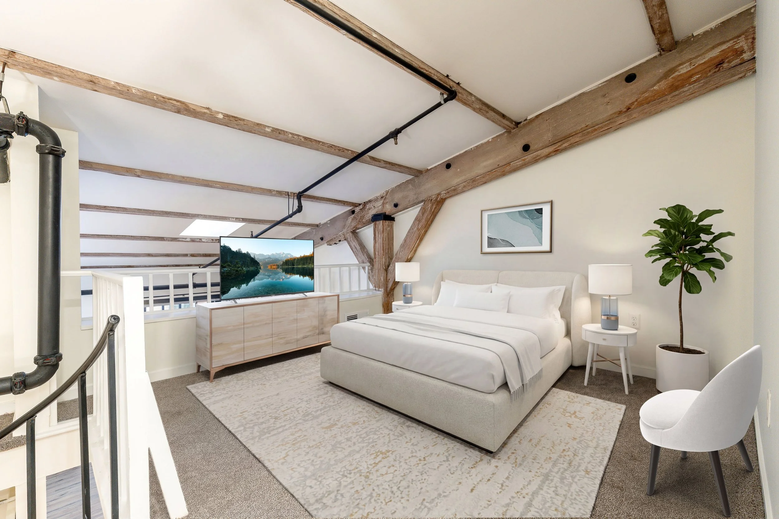A cozy bedroom with exposed wooden beams on the ceiling, a white bed with white bedding, a bedside table with a lamp, a large potted plant, and a flat-screen TV facing the bed.
