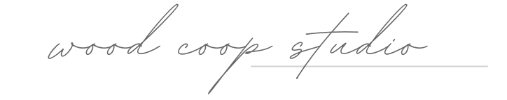 Handwritten text that reads 'wood coop studio'.
