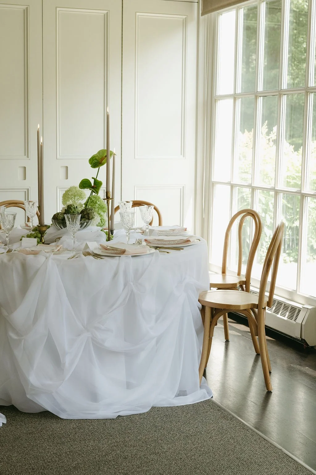 Langdon Hall tablescape with artichokes and taper candles