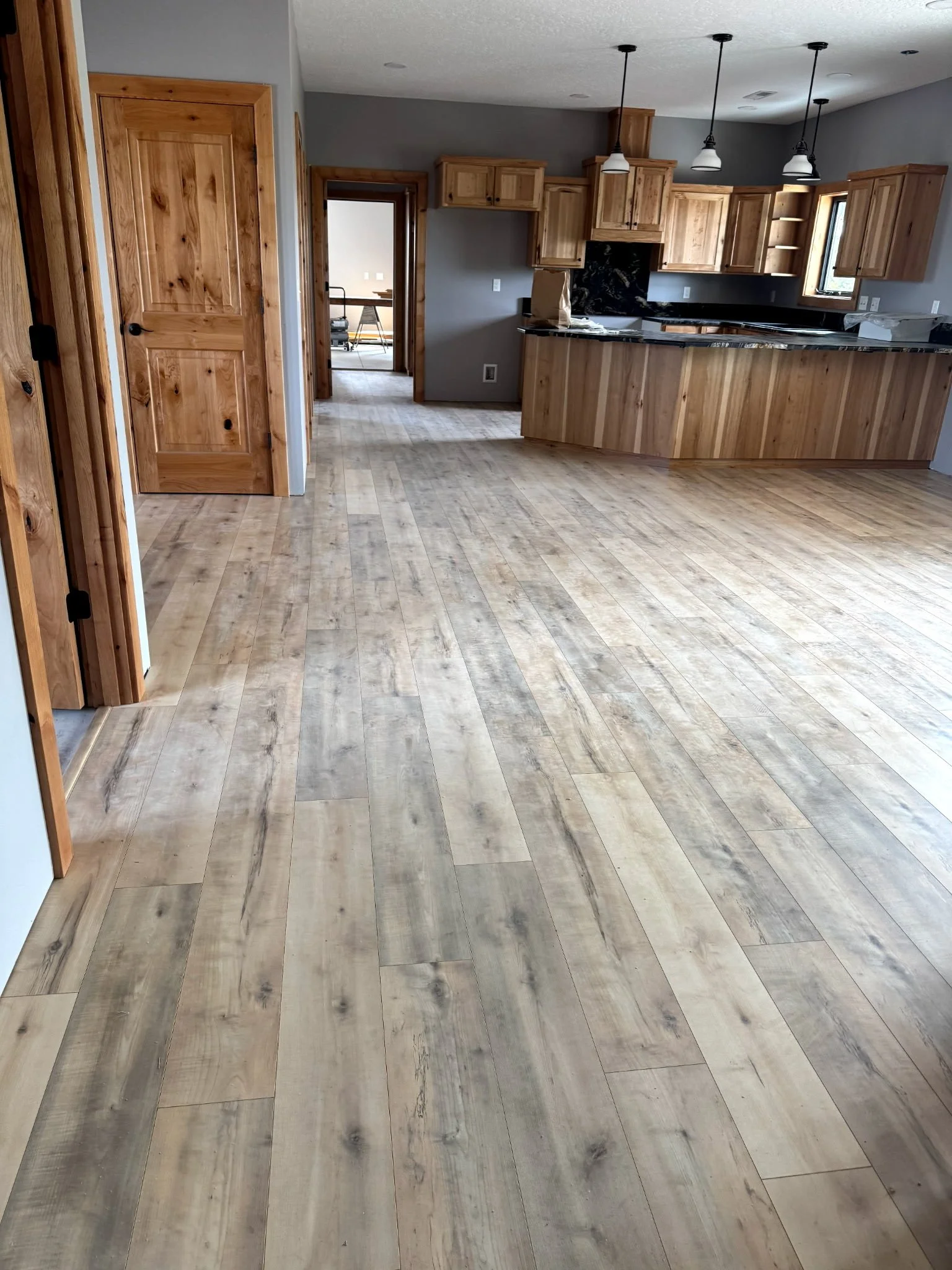 Large open modern dining room and kitchen installed by Northwest Home Innovations.