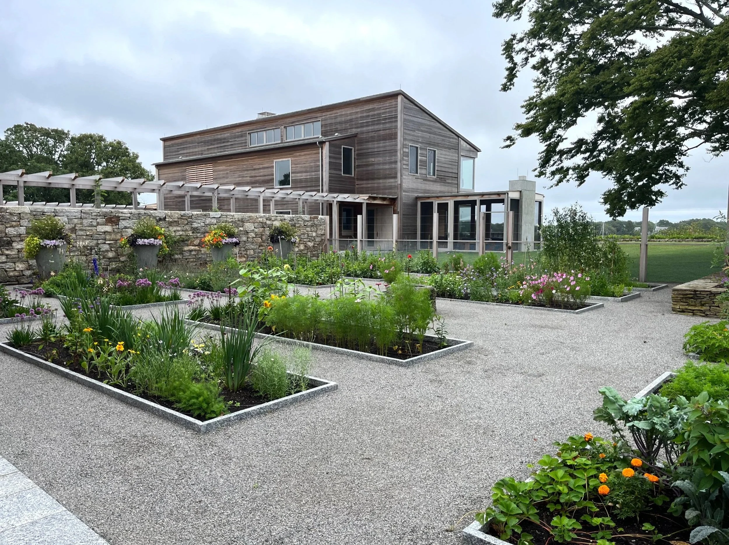 Formal vegetable, herb, and flower garden at modern family compound, coastal Massachusetts.