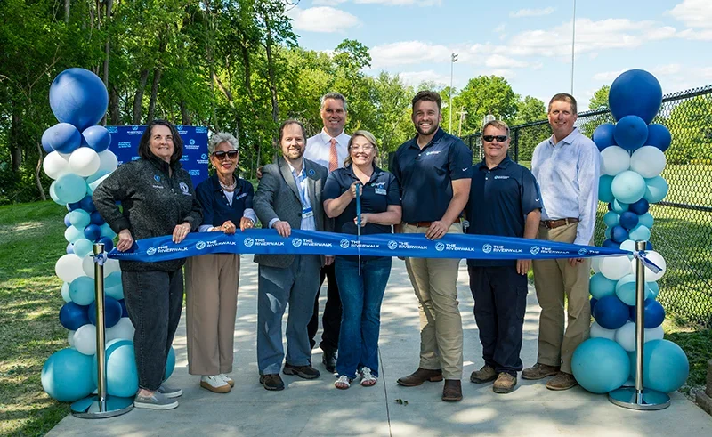 Southbank Partners, community stakeholders celebrate grand opening of newest stretch of Riverwalk in Ludlow