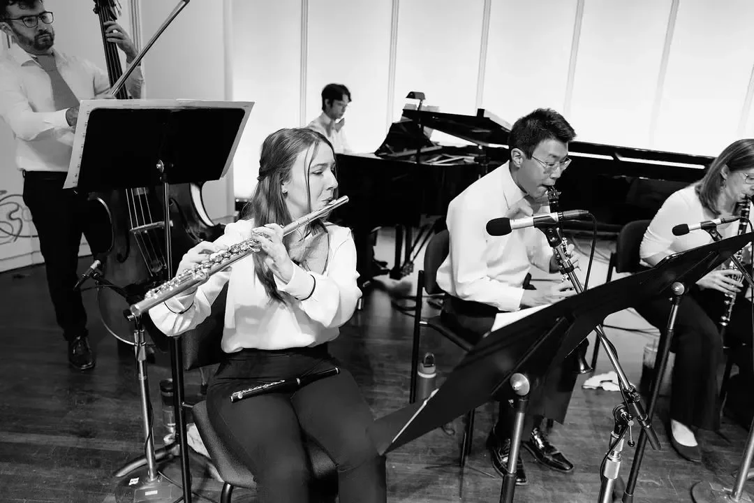 Lizzy O'Brien playing flute during rehearsal for "Dr. Seuss Goes to the Opera" with JAM Orchestra at Martin Theater, Ravinia Festival.