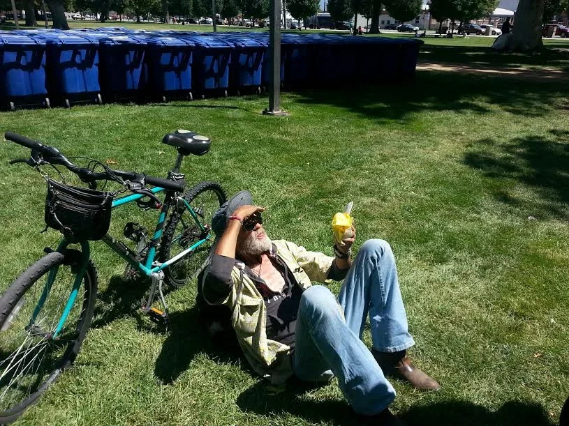 A homeless man about to enjoy a sandwich from HCH