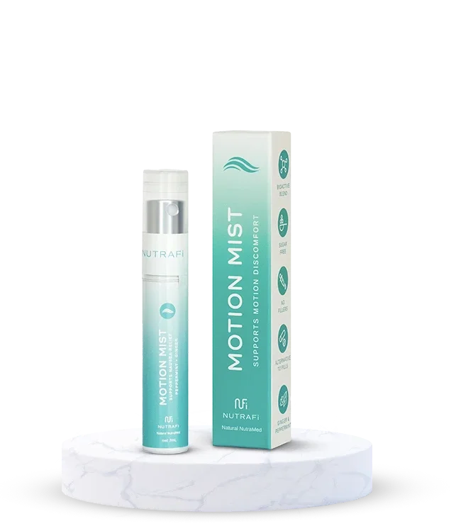 A bottle and box of NutraFi Motion Mist spray on a white marble platform