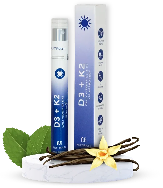 Vitamin supplement packaging for D3 + K2 displayed on a marble surface, with vanilla flowers, vanilla beans, and green leaves around it.