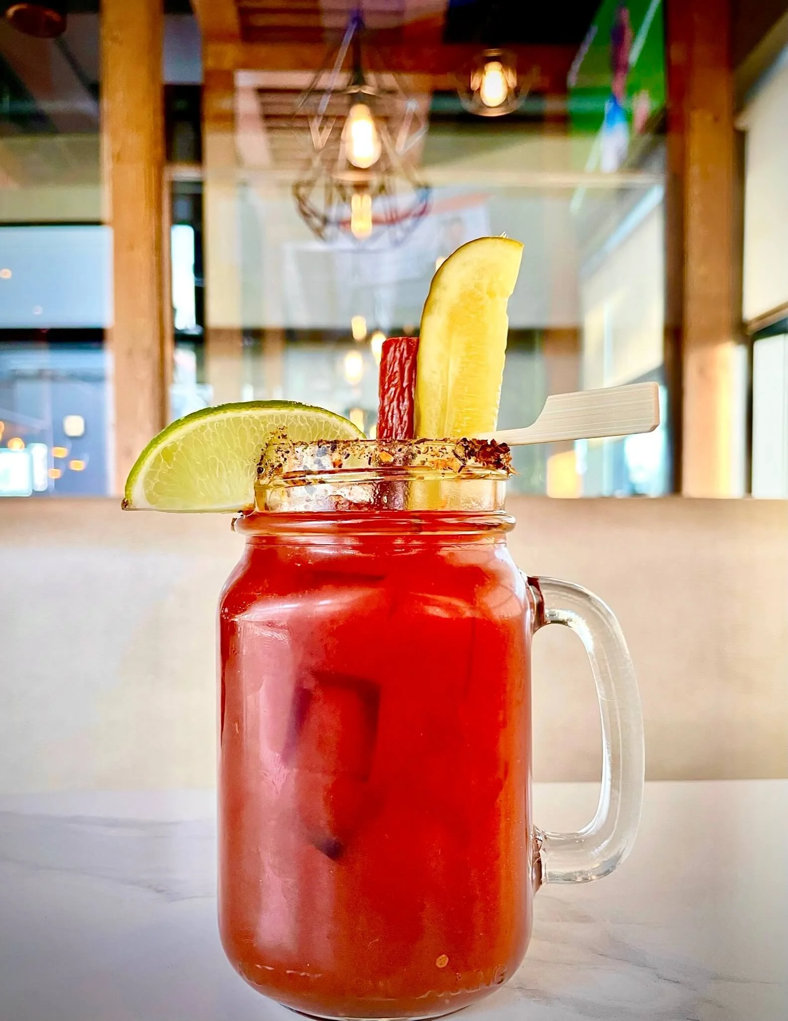 Caesar with pickle, pepperoni stick, and line wedge