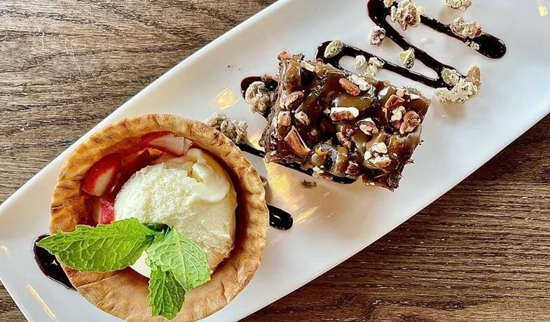 Chocolate Brownie with ice cream in a waffle dish