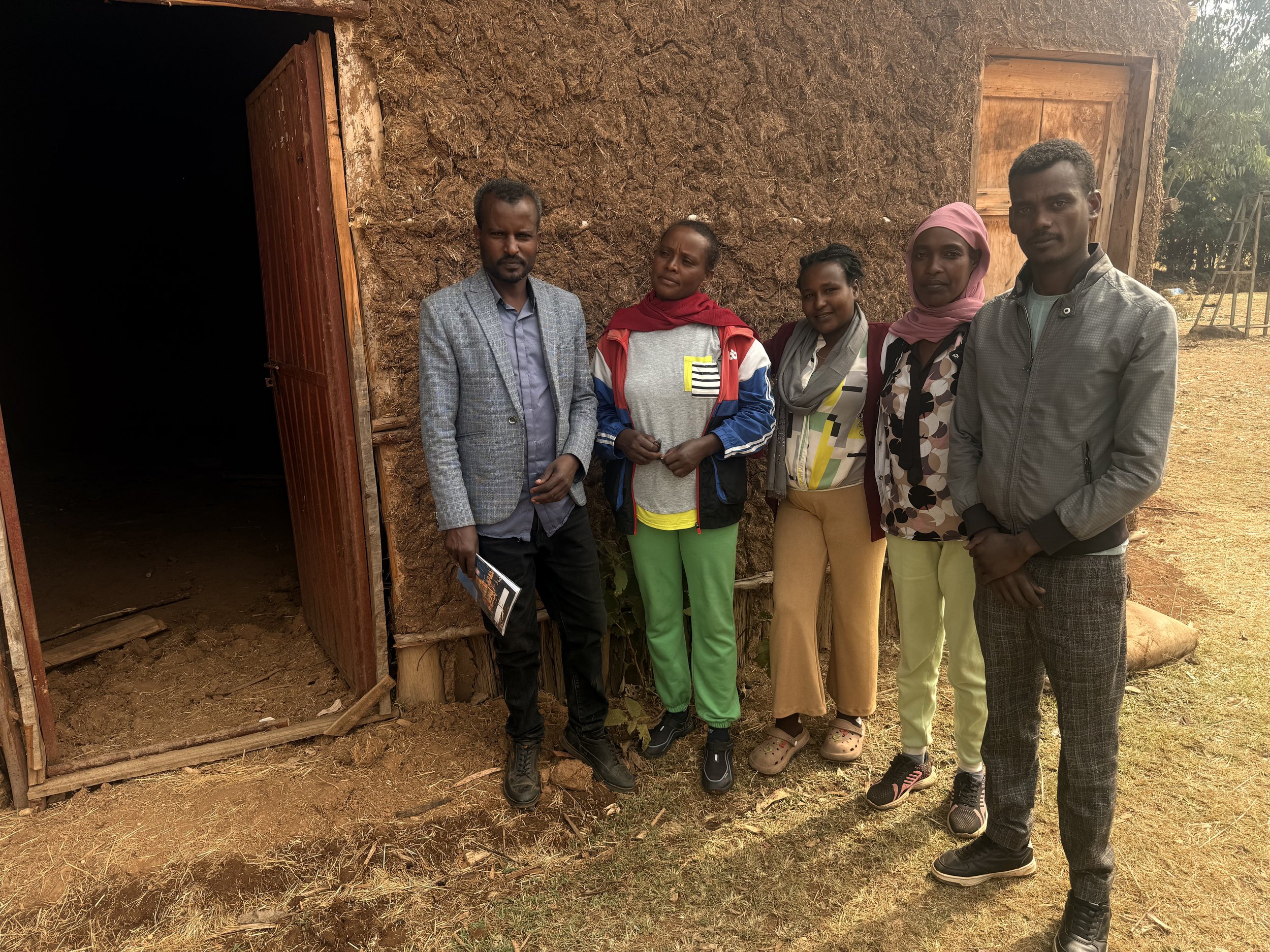 Teachers in front of their rooms