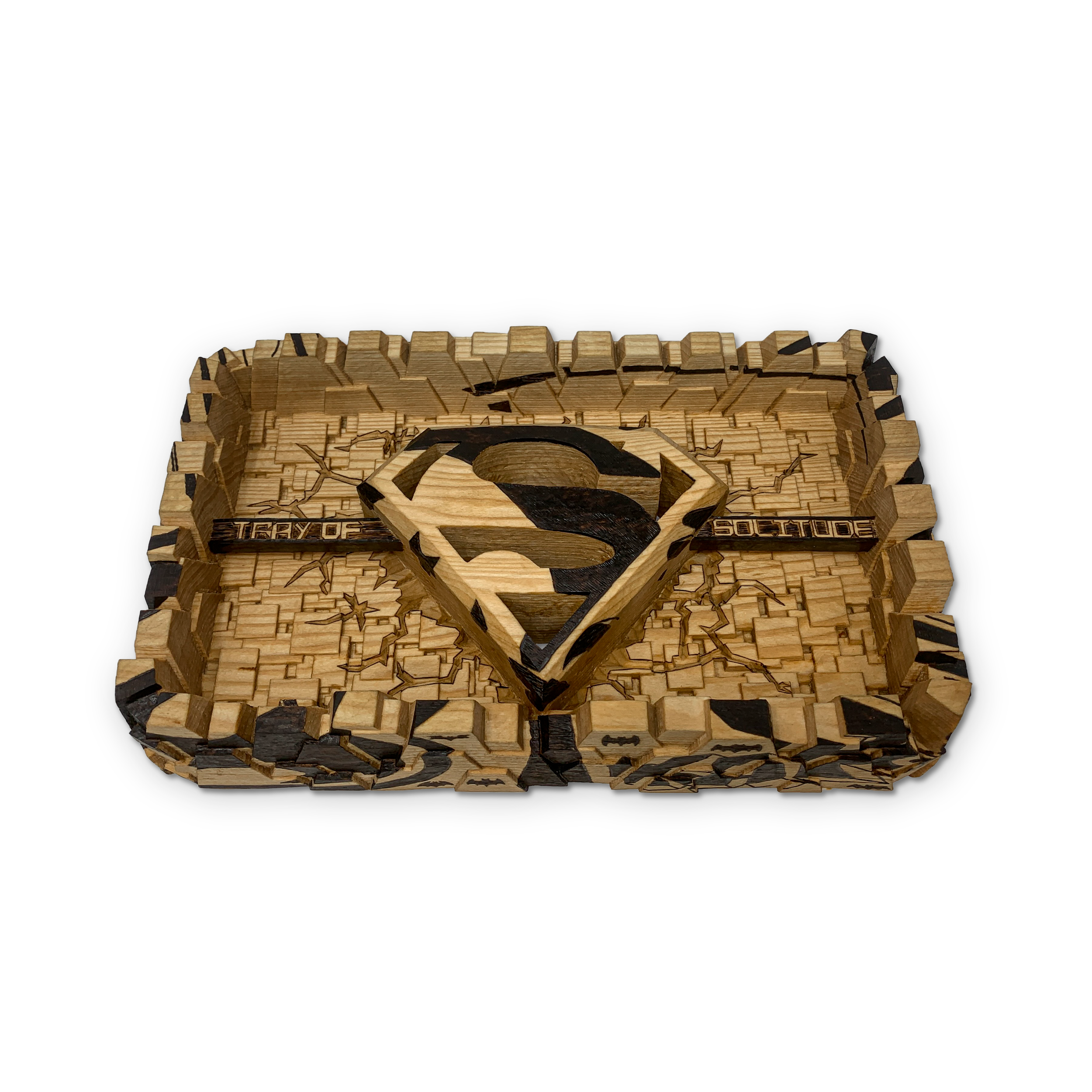 Close-up of a wooden puzzle with a Superman logo design on top against a black background.