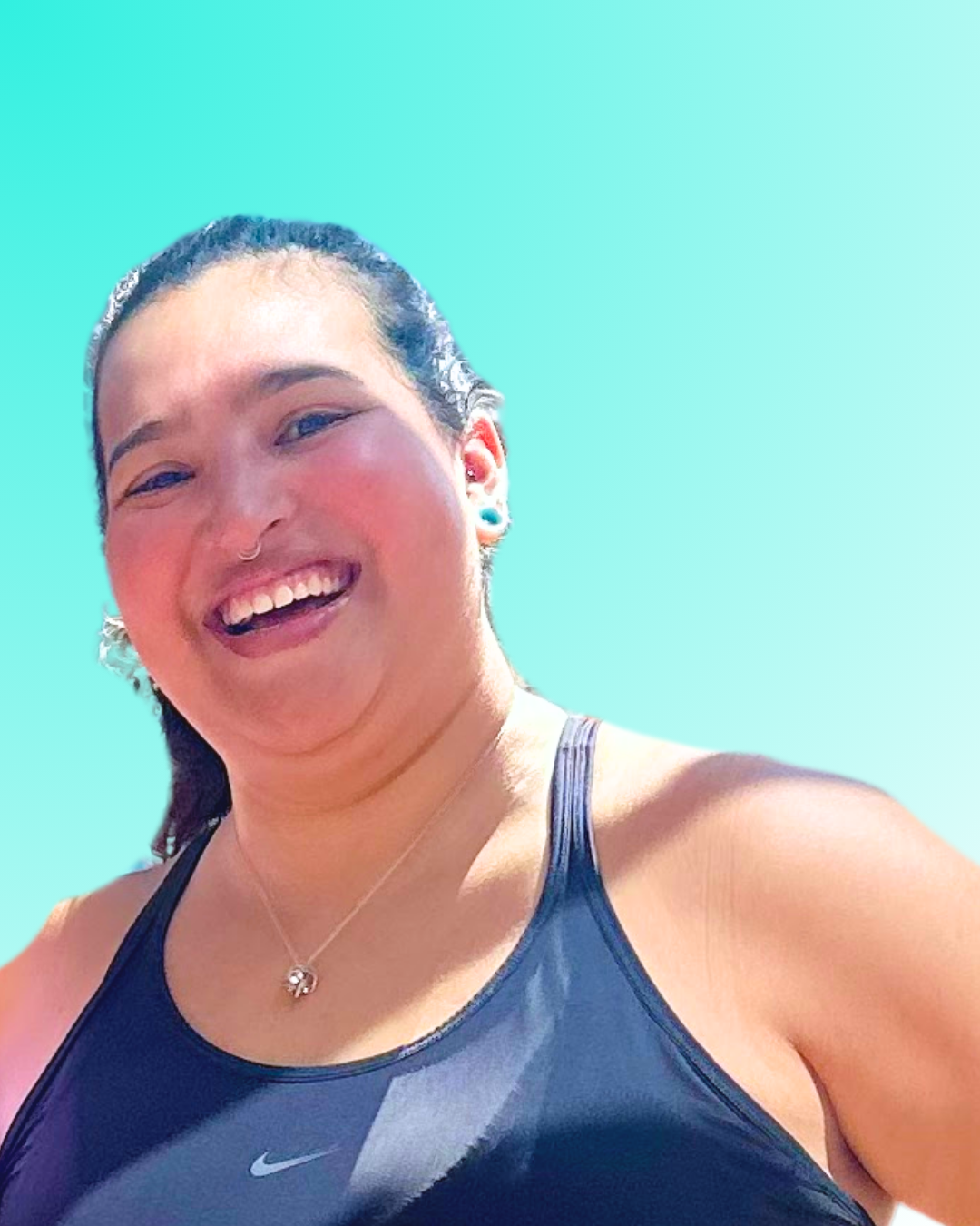 A bold woman, Sophia, smiling, wearing a blue athletic tank top, against a light blue gradient background.