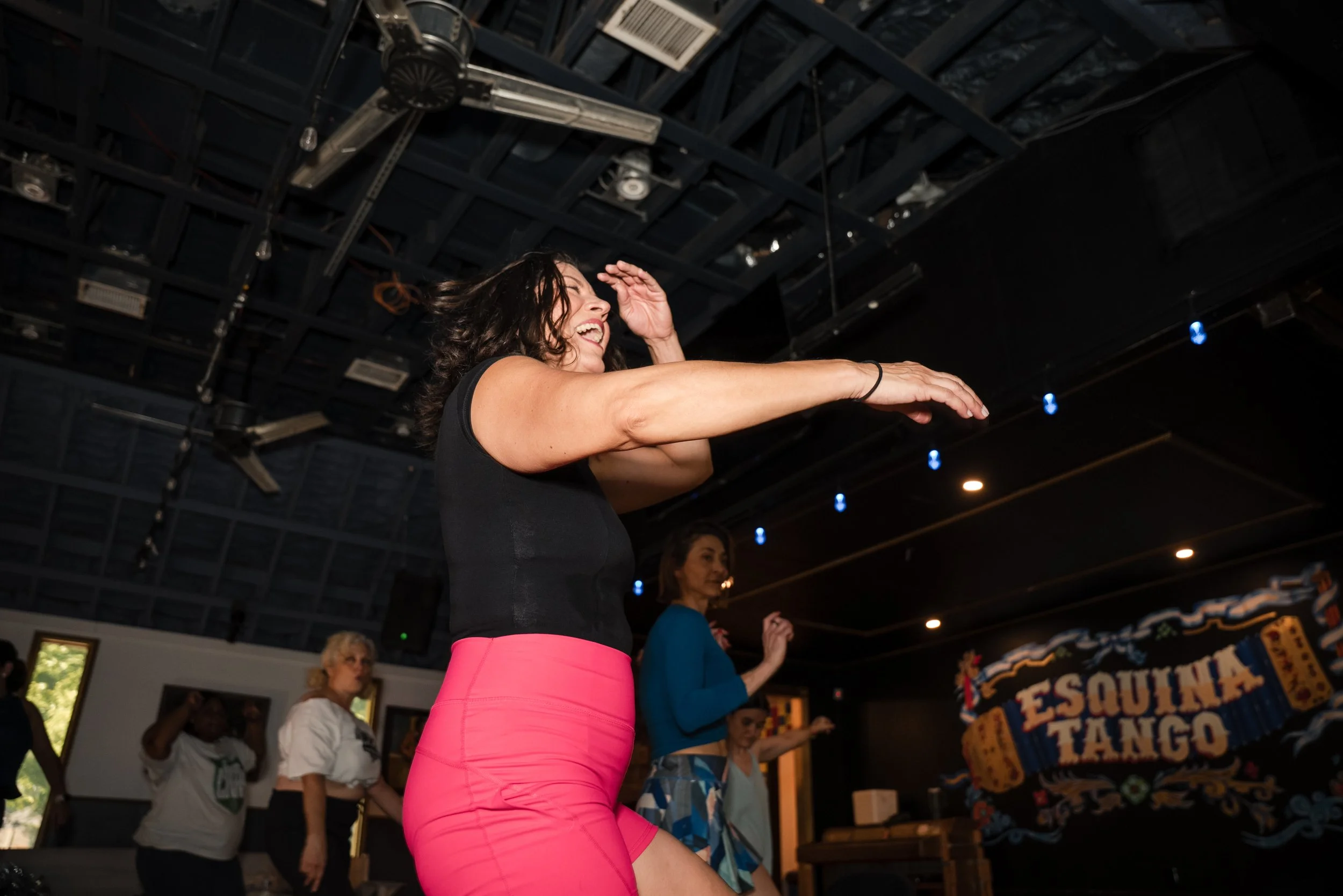 Melissa Acosta with other bold women at Mama's Dance Party, a dance fitness event