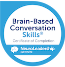 Blue circular badge with white text that reads "Brain-Based Conversation Skills" and the NeuroLeadership Institute logo at the bottom.