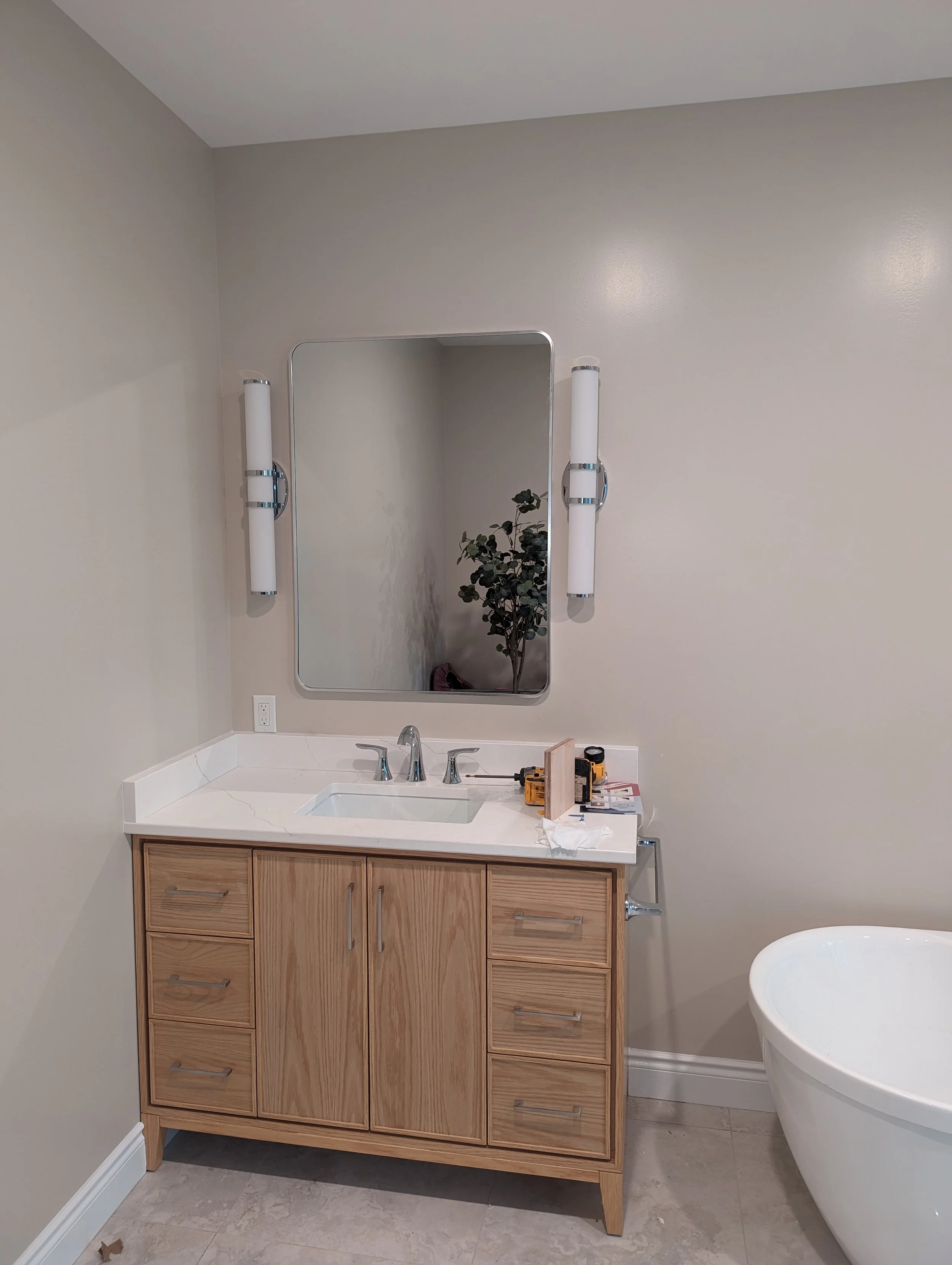 Matching bathroom mirror and towel rack install