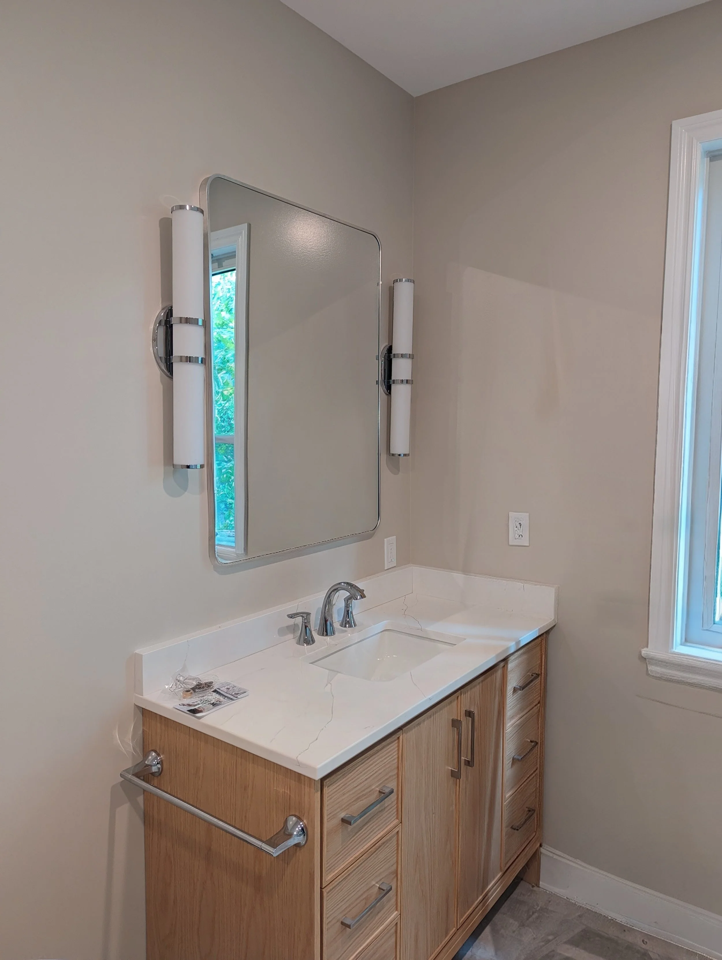 Matching bathroom mirror and towel rack install