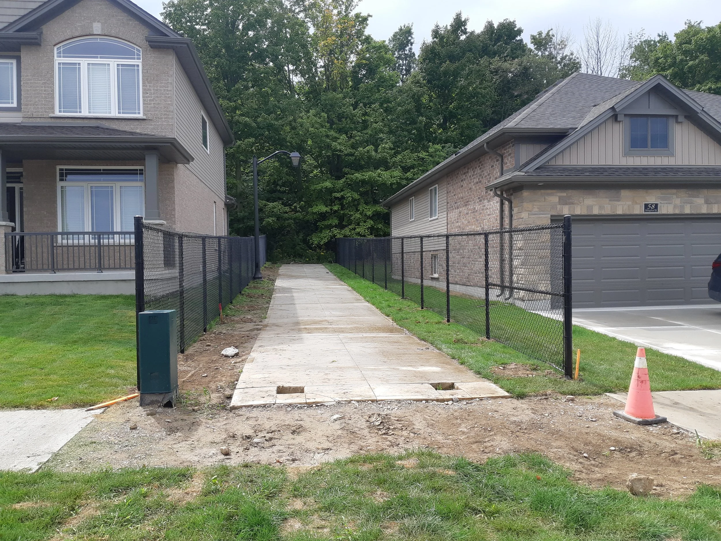 Neighborhood walk way chain link install