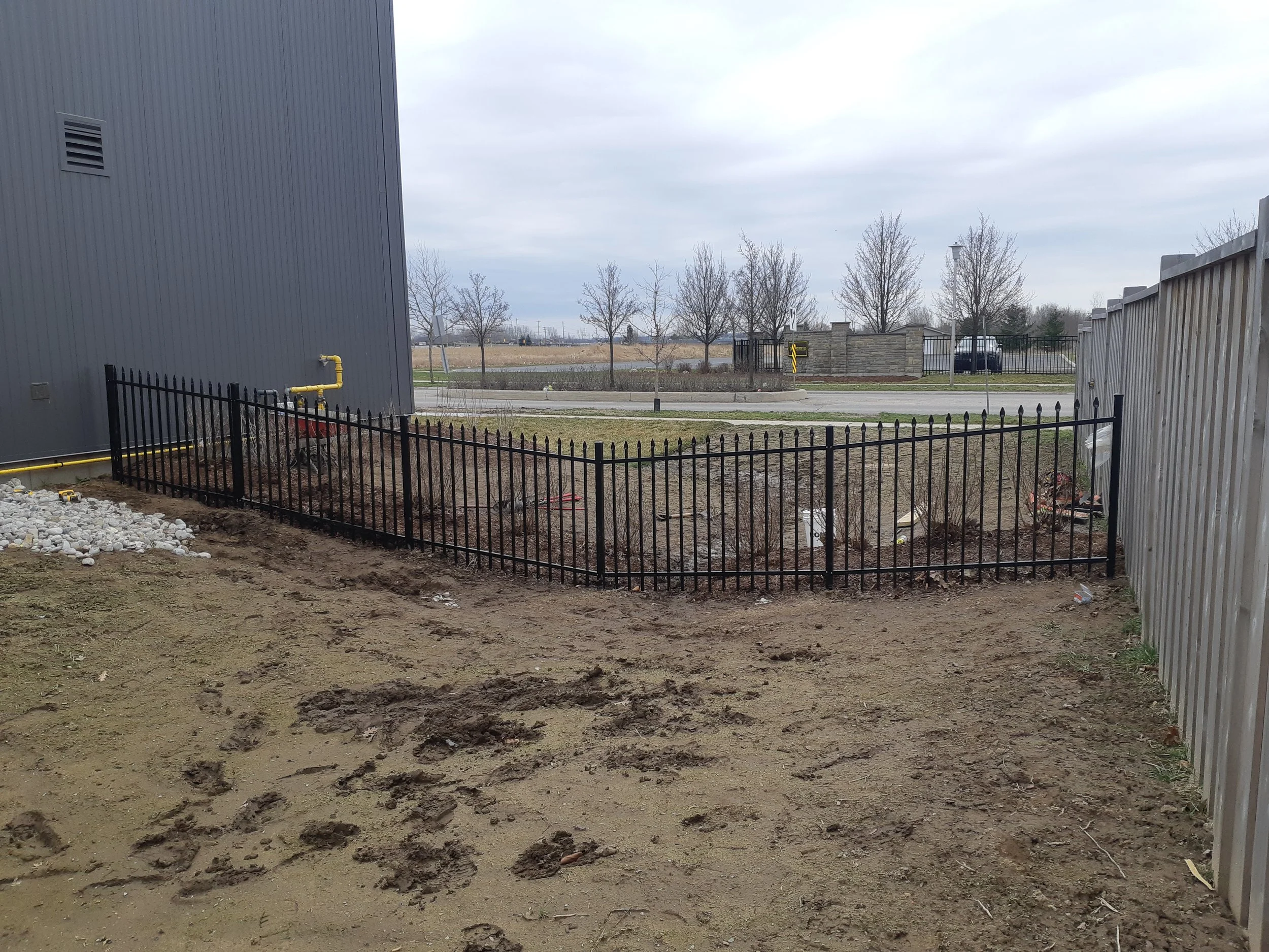 Wrought iron fence install