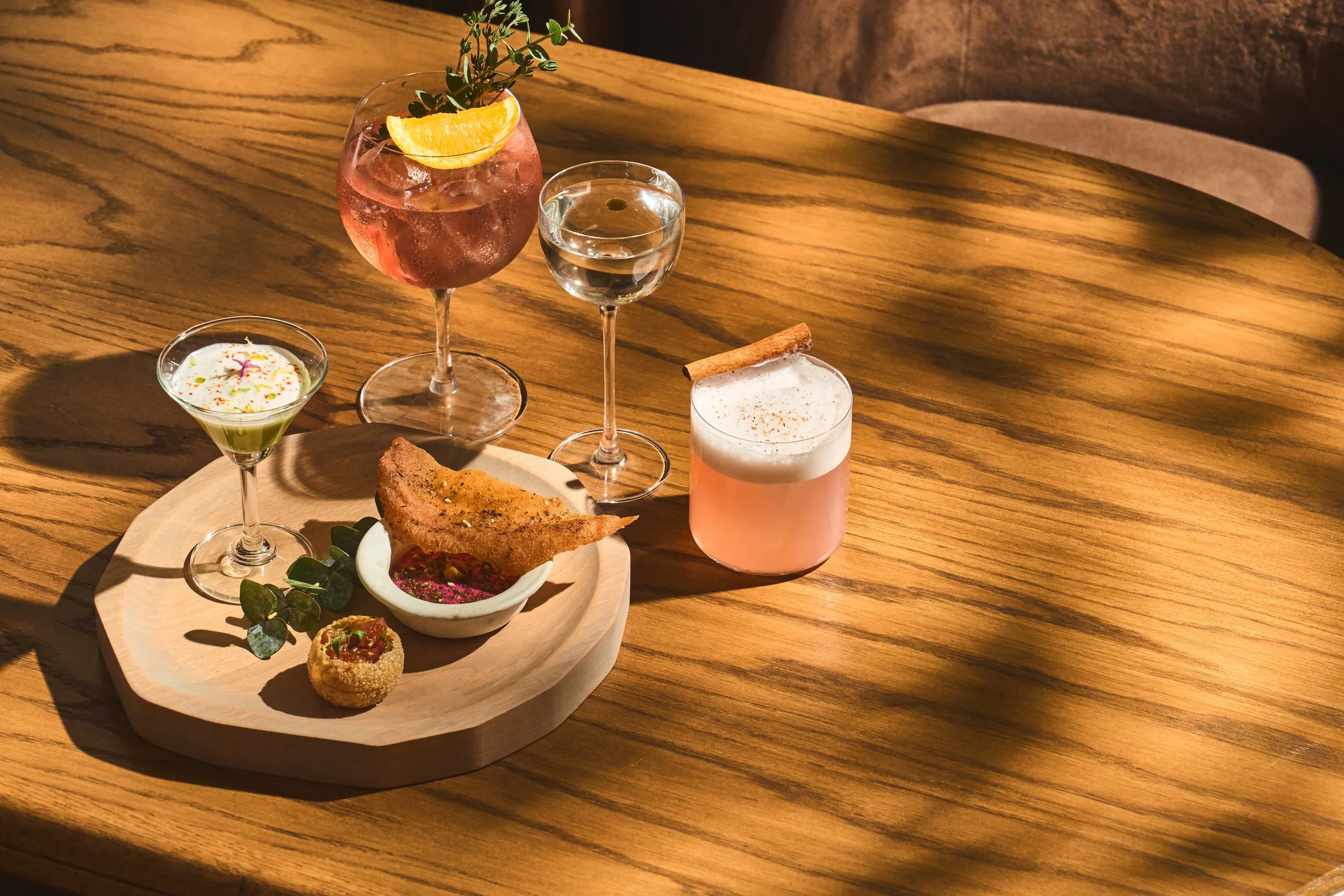 4 Cocktail drinks with a little appetizer for golden hour at AVA Coconut Grove.