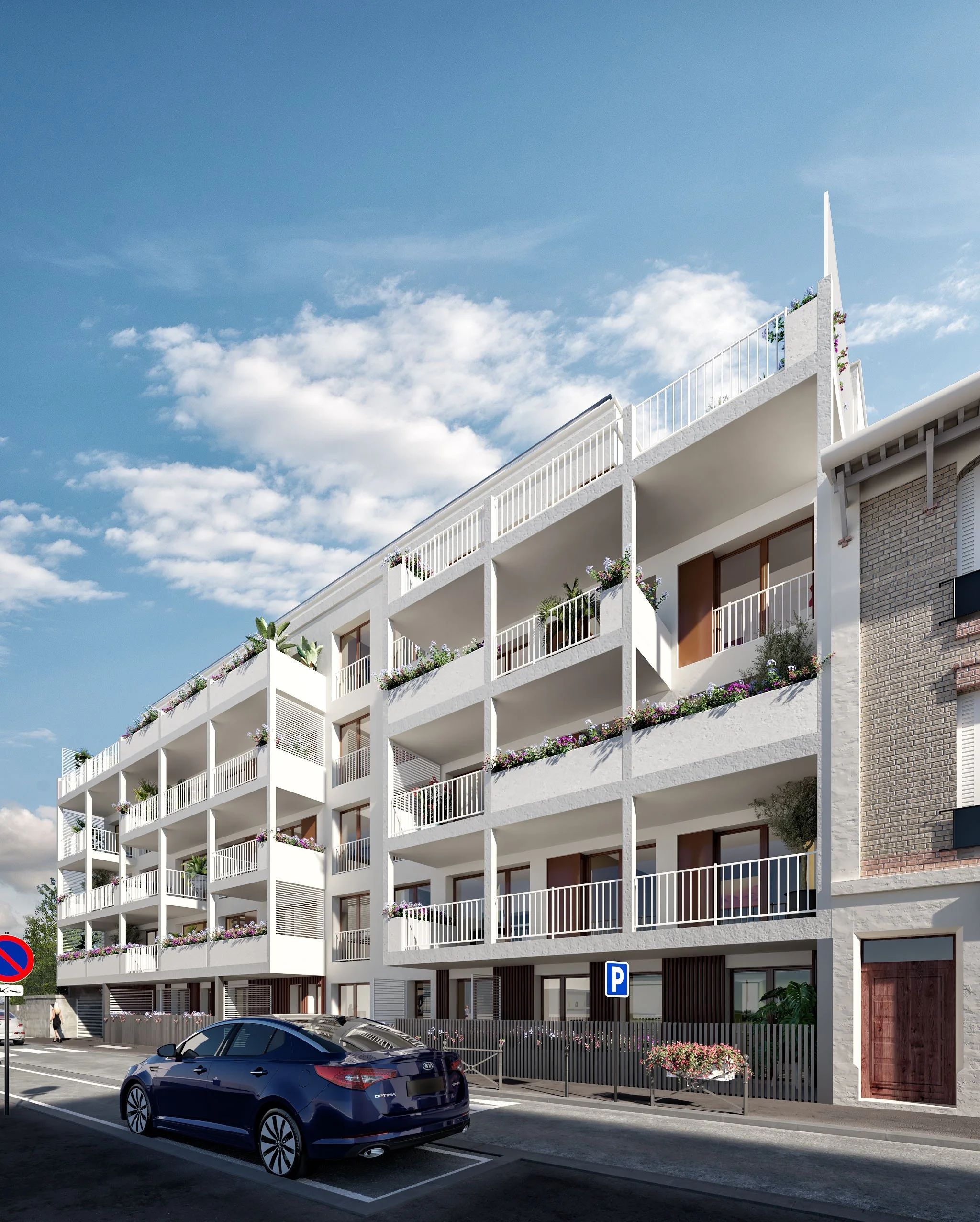 Modern white apartment building with balconies and plants, parked cars, and a blue sky with clouds.