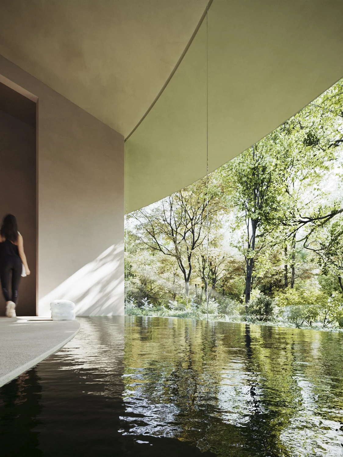 Modern building with a large open window overlooking a lush green forest with trees and sunlight, a person walking inside, and a reflective water feature in front.