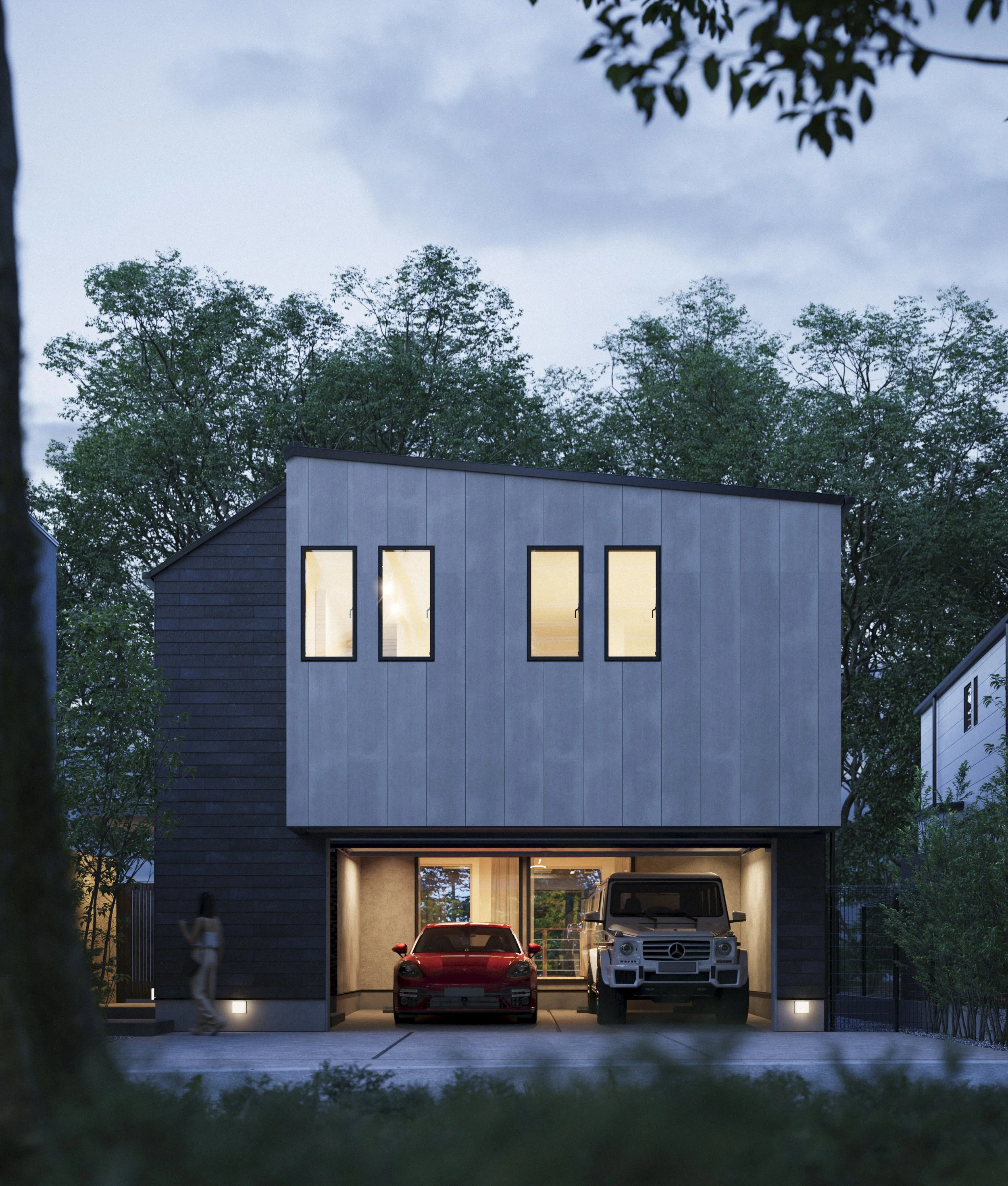 Modern two-story house with a garage, two cars parked inside, illuminated windows at dusk, surrounded by trees and greenery.