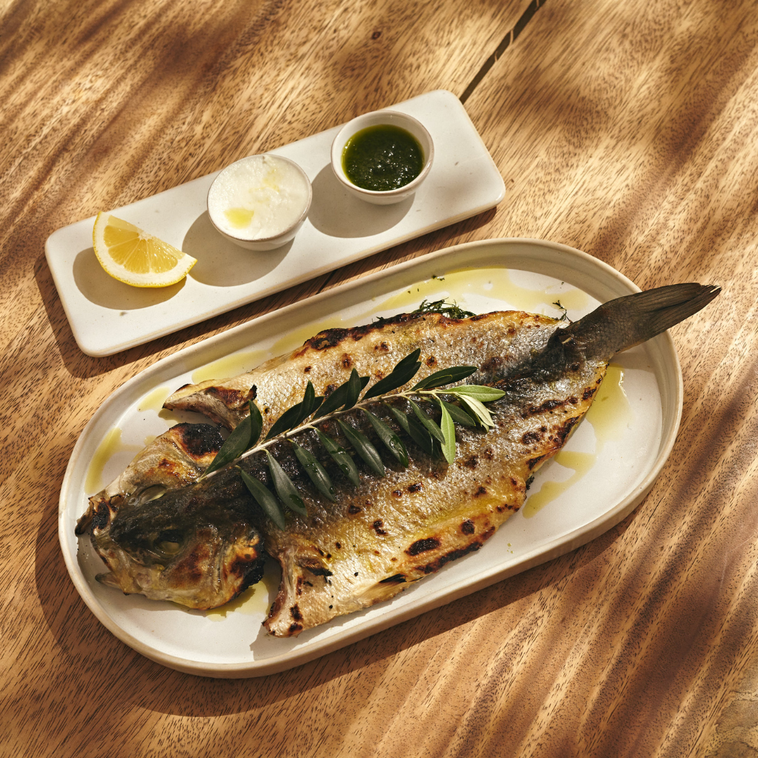 AVA Winter Park's menu item of a fish elegantly presented.
