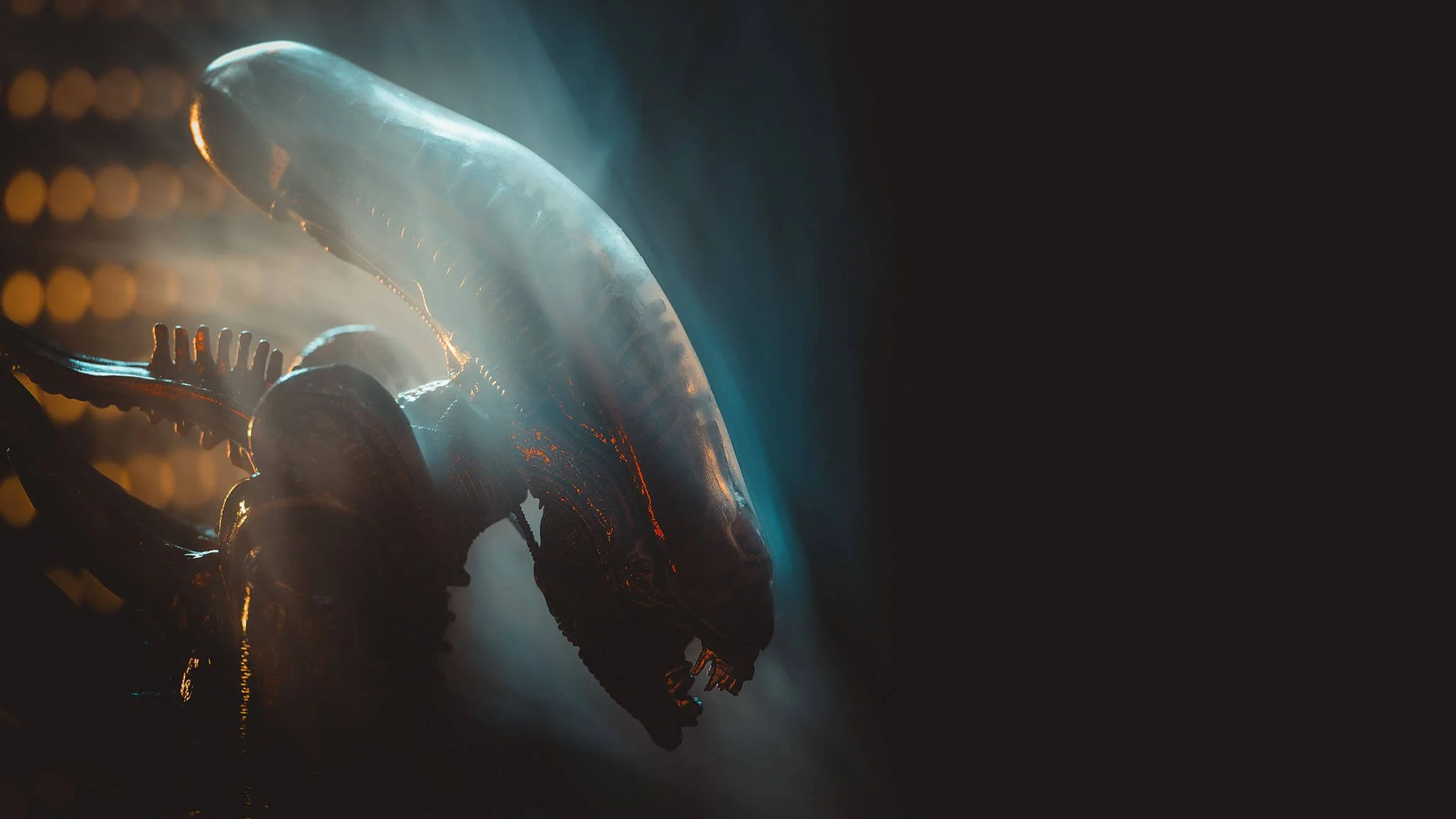 Close-up of a metallic robot hand with glowing blue background and dark surroundings.