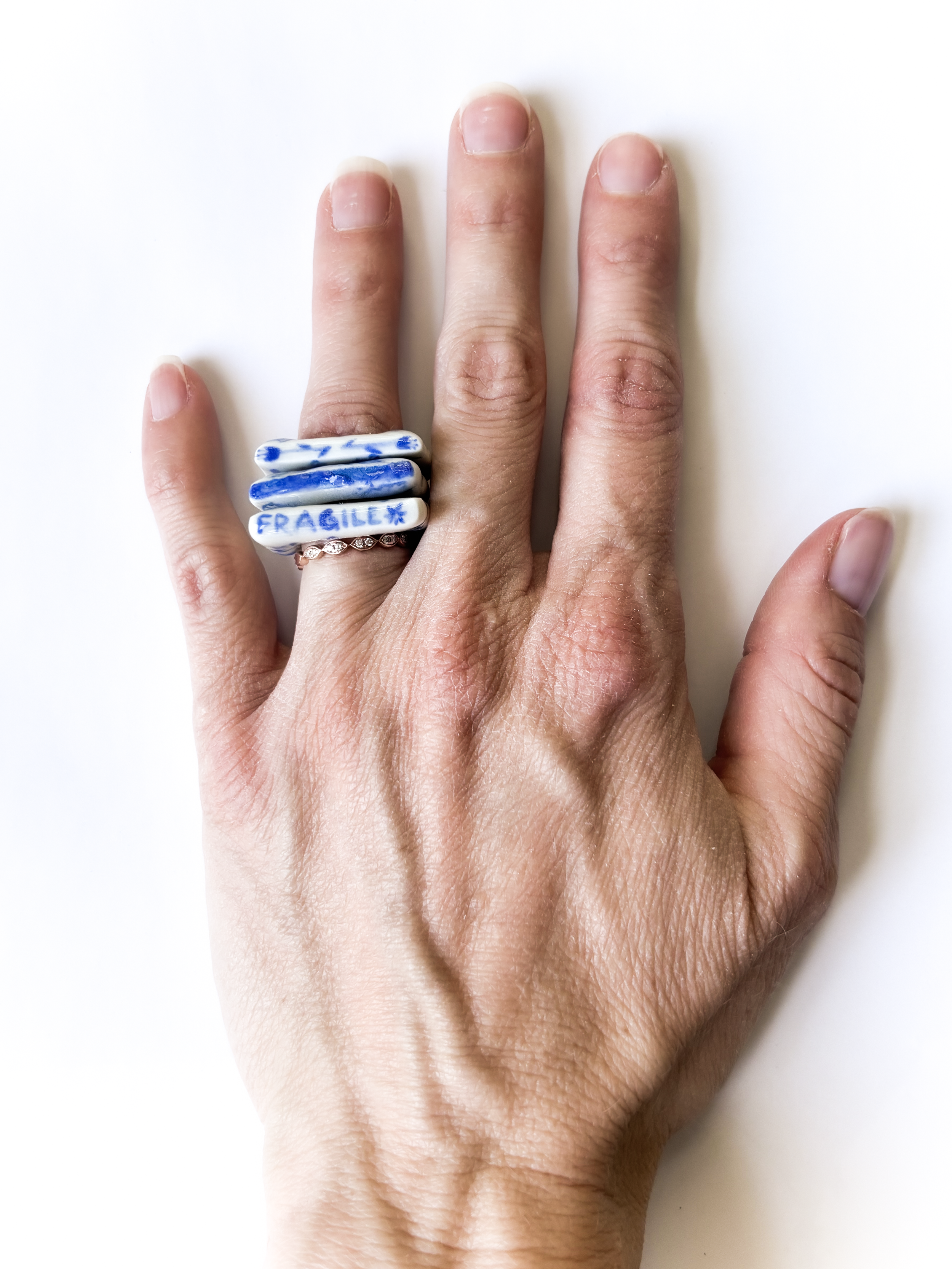 Not Okay Club-stack-floral-porcelain-ring-swear-word-jewelry-fragile-like-a-bomb-ceramic copy.png