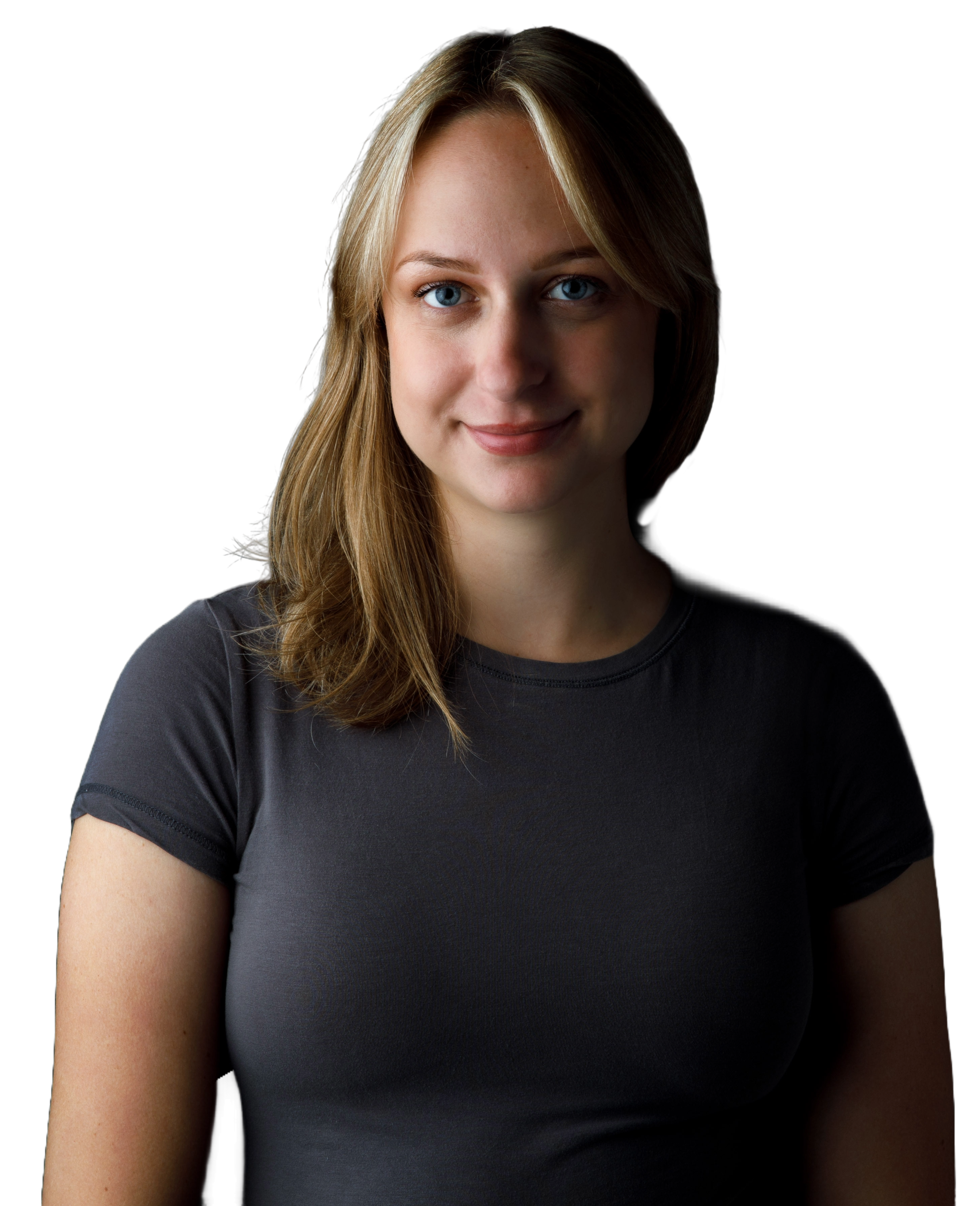 Portrait of a young woman with blonde hair and blue eyes, smiling gently, wearing a grey t-shirt, against a dark background.