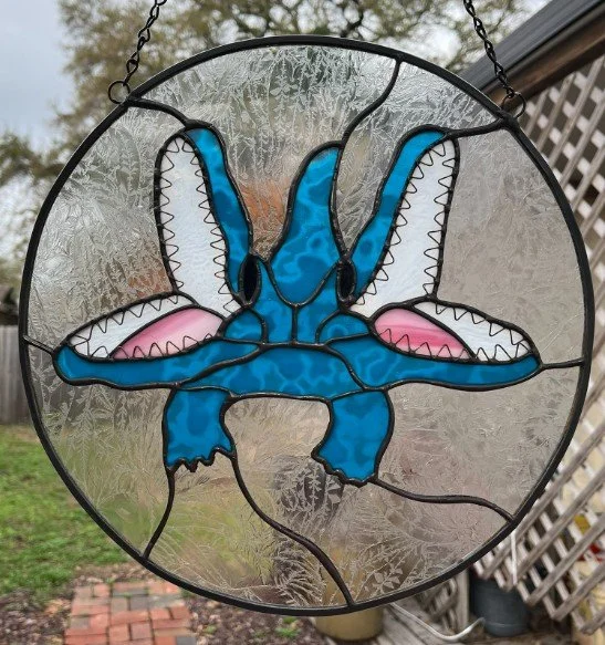 2 headed gator with blue mottled glass.jpg