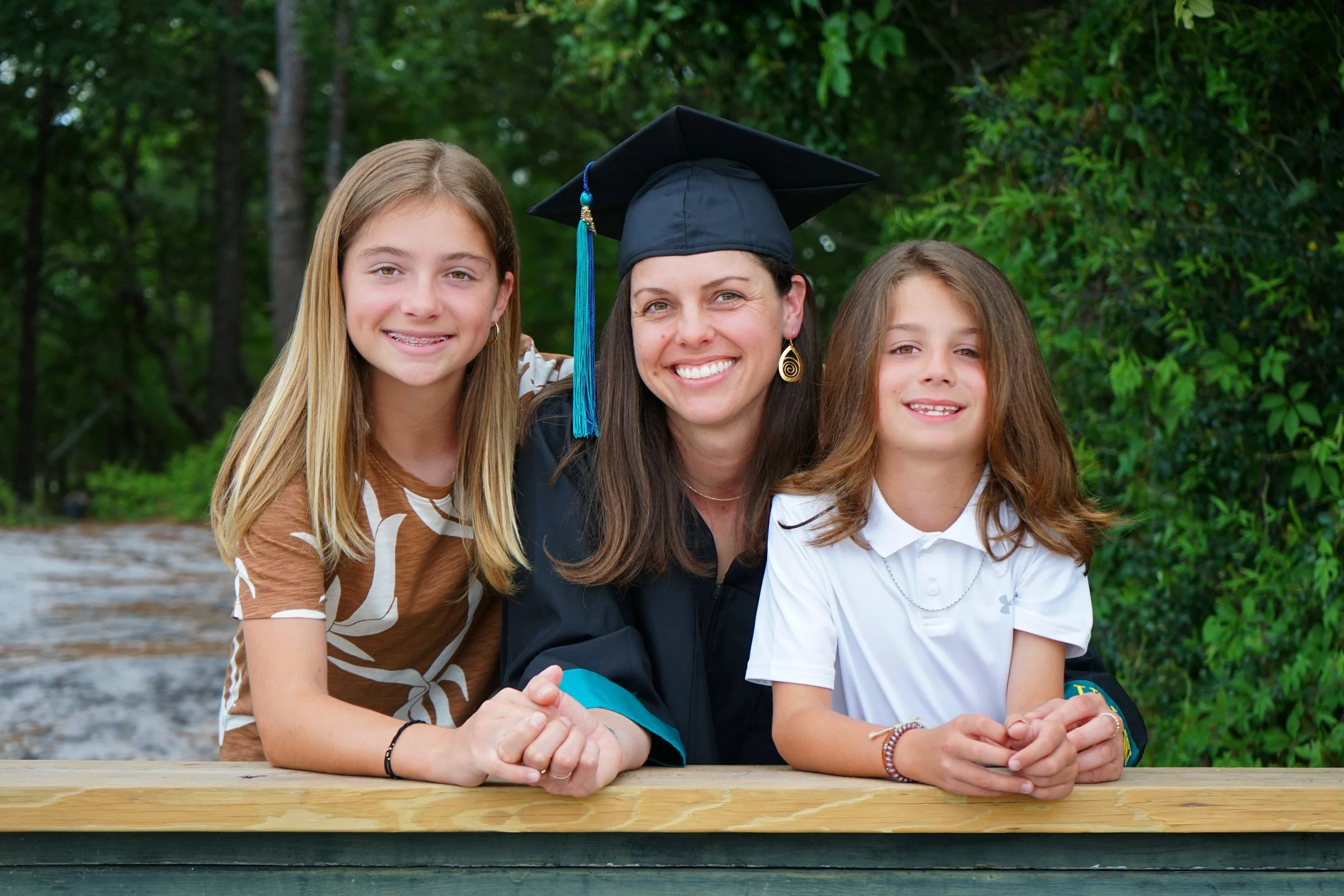 Family photo for graduation in Kure Beach, NC.