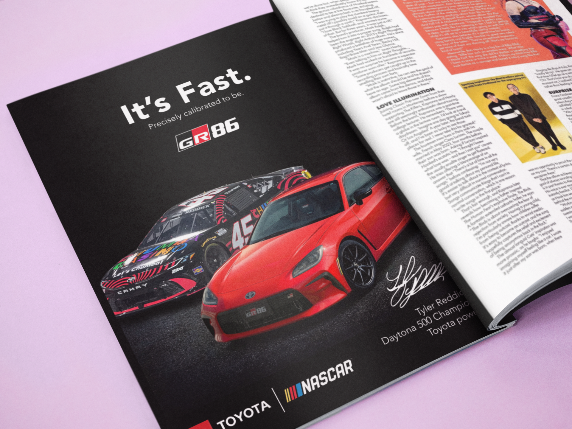 open-magazine-lying-on-a-pink-surface-template-a14485.png