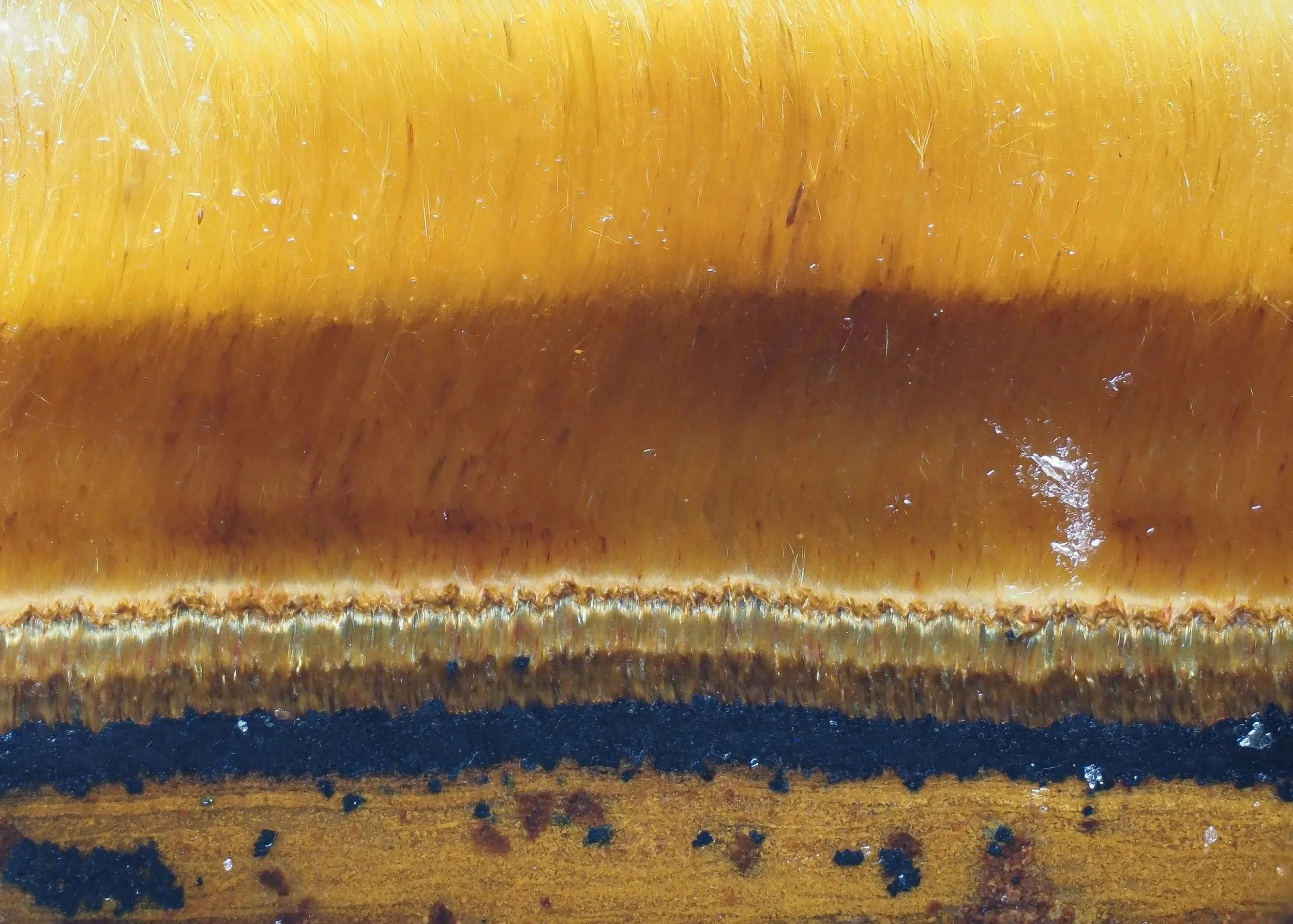 Close-up of a rusty metal pipe, showing the surface with rust and corrosion.