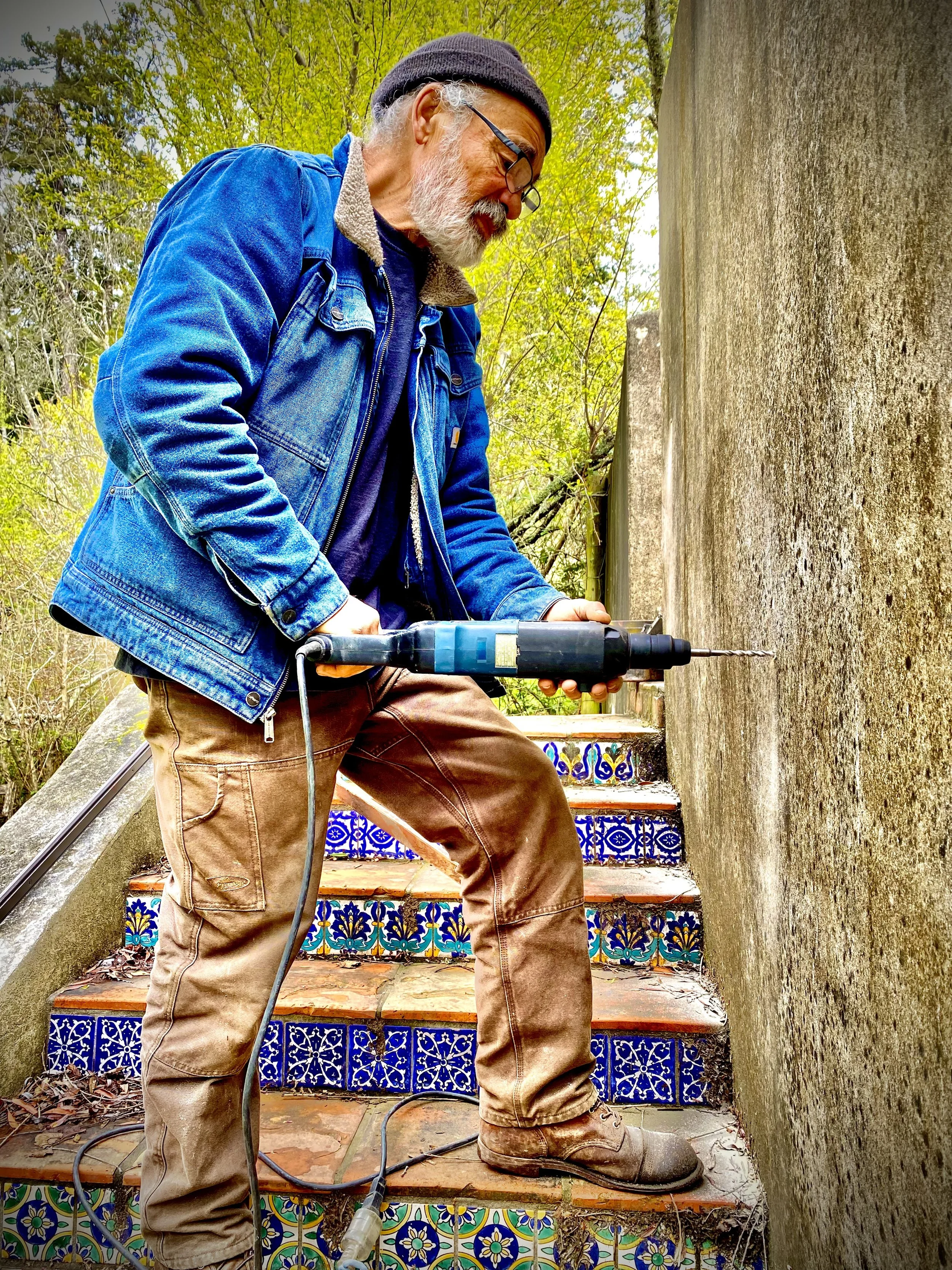 Attaching a handrail to a retaining wall